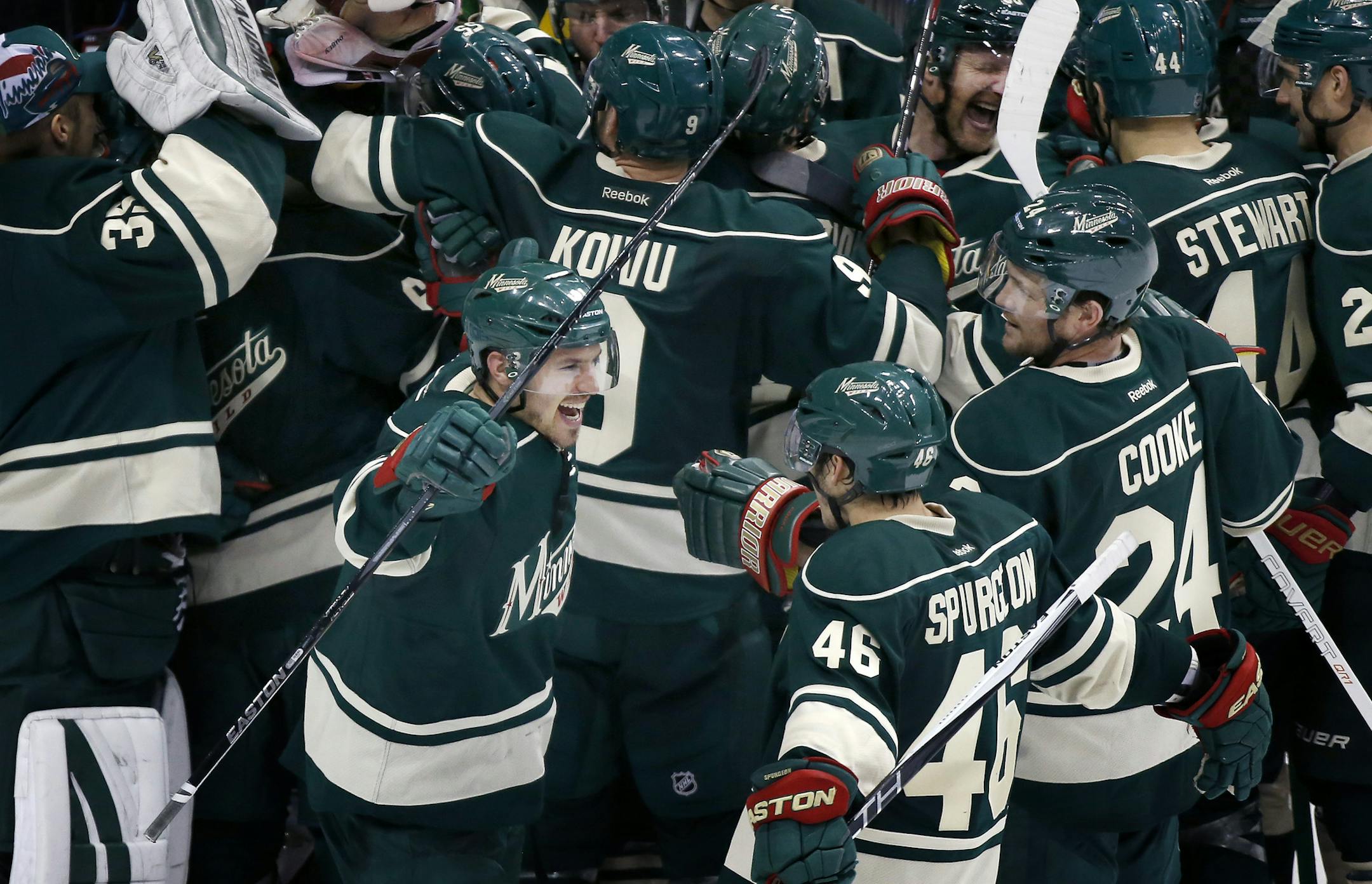 Zach Parise (11) and Minnesota Wild players celebrated at the end of the game. Minnesota beat St. Louis by a final score of 4-1 to advance to the next round of the Stanley Cup Playoffs. ] CARLOS GONZALEZ cgonzalez@startribune.com, April 26, 2015, St. Paul, Minn., Xcel Energy Center, NHL, Minnesota Wild vs. St. Louis Blues, Game 6, Stanley Cup Playoffs