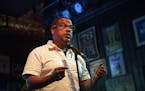 Rep. Keith Ellison spoke the the crowd on the stage at campaign party after winning the democratic nomination for Attorney General at Nomad World Pub 
