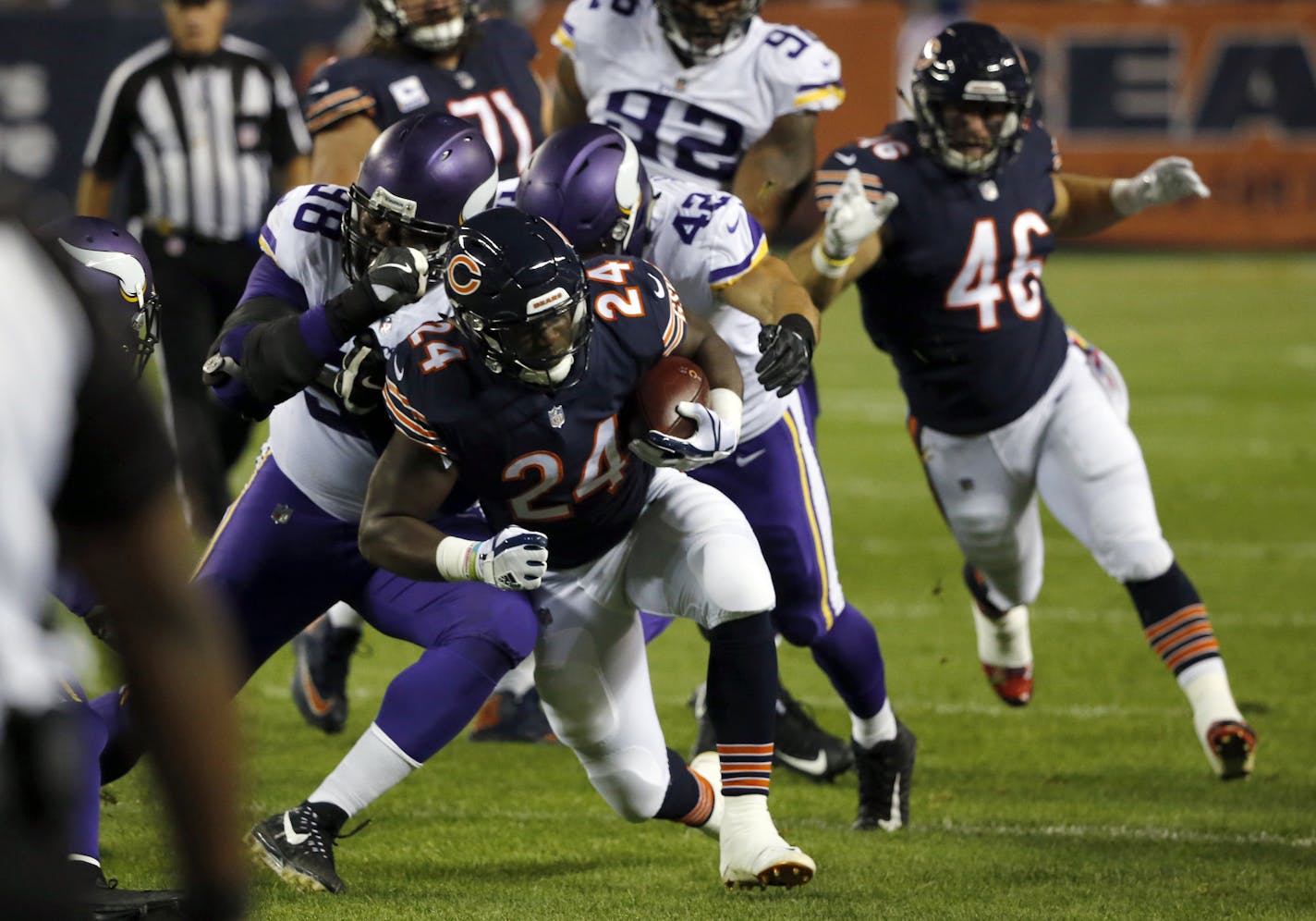 Minnesota Vikings defensive tackle Linval Joseph (98) and outside linebacker Ben Gedeon (42) tackle Chicago Bears running back Jordan Howard (24) during the first half of an NFL football game, Monday, Oct. 9, 2017, in Chicago. (AP Photo/Charles Rex Arbogast)