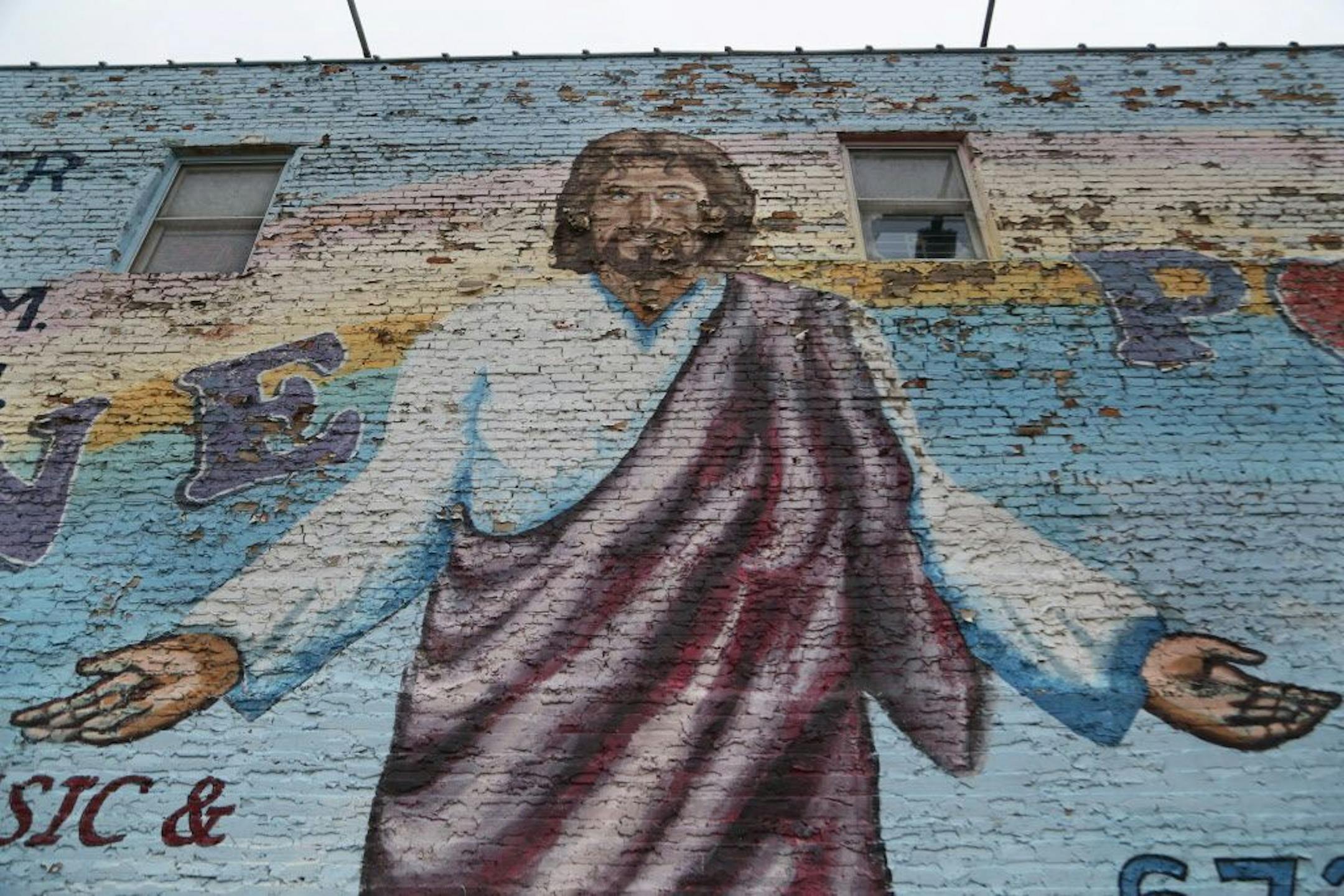 "Love Power" Jesus mural in Minneapolis' West Bank neighborhood Thursday, Aug. 3, 2017, in Minneapolis, MN.
