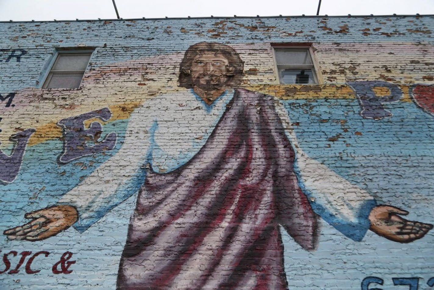 "Love Power" Jesus mural in Minneapolis' West Bank neighborhood Thursday, Aug. 3, 2017, in Minneapolis, MN.