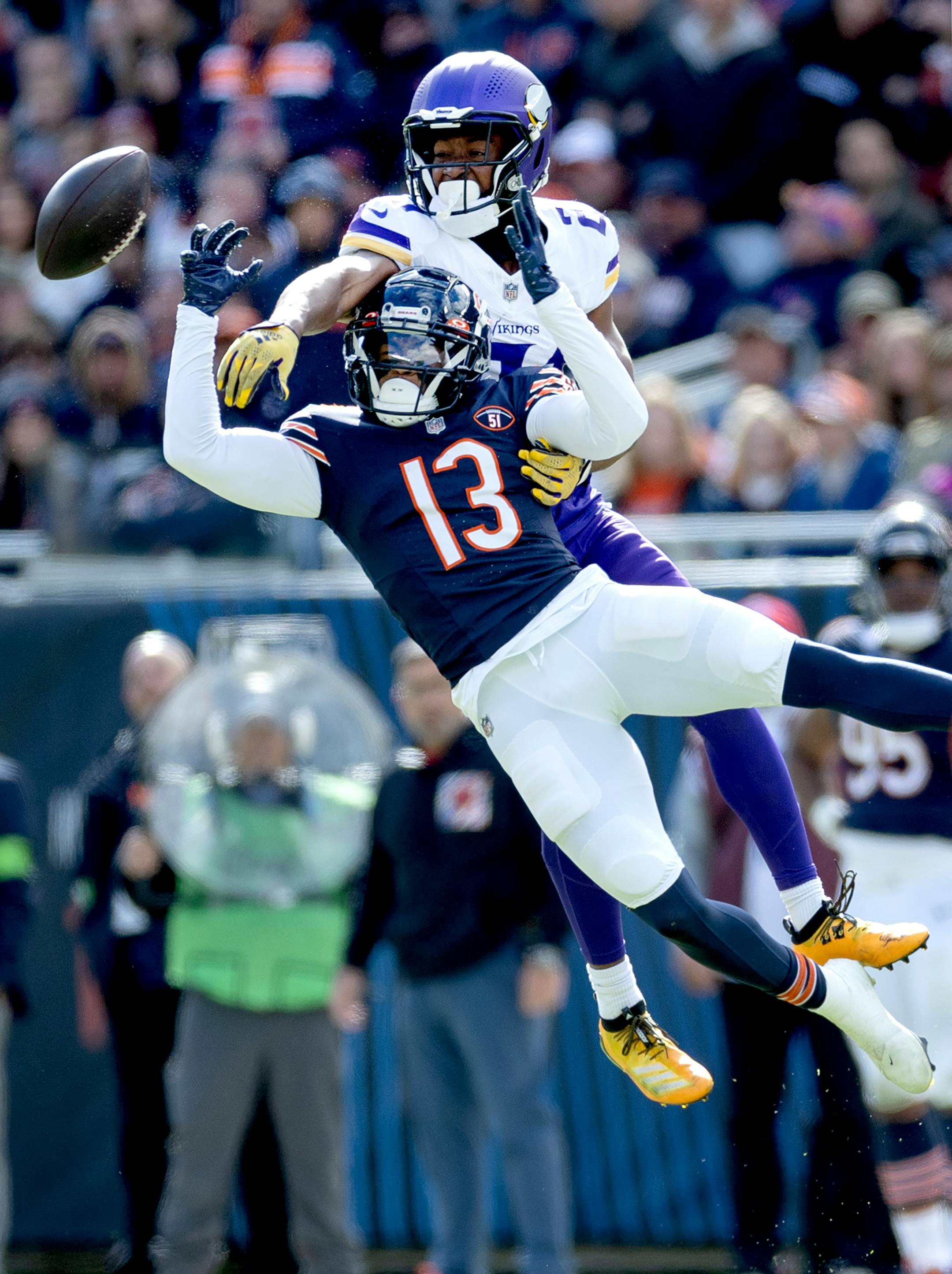 Minnesota Vikings defensive back Akayleb Evans (21) was called for pass interference while covering Tyler Scott (13) of the Chicago Bears in the third quarter.