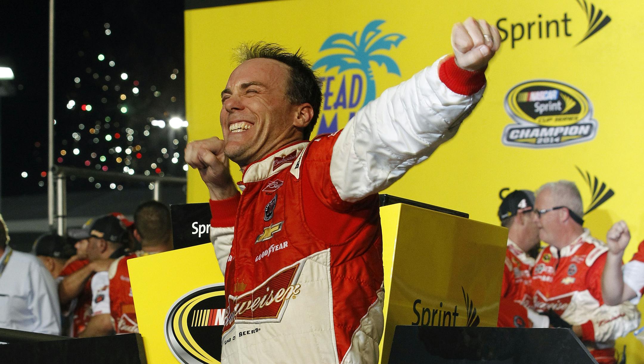 Kevin Harvick celebrates winning the NASCAR Sprint Cup championship series auto race, Sunday, Nov. 16, 2014 in Homestead, Fla. (AP Photo/Terry Renna)