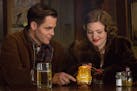 In this image released by Disney, Chris PIne, left, and Holliday Grainger appear in a scene from, "The Finest Hours," a heroic action-thriller based o