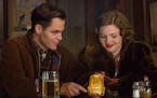 In this image released by Disney, Chris PIne, left, and Holliday Grainger appear in a scene from, "The Finest Hours," a heroic action-thriller based o
