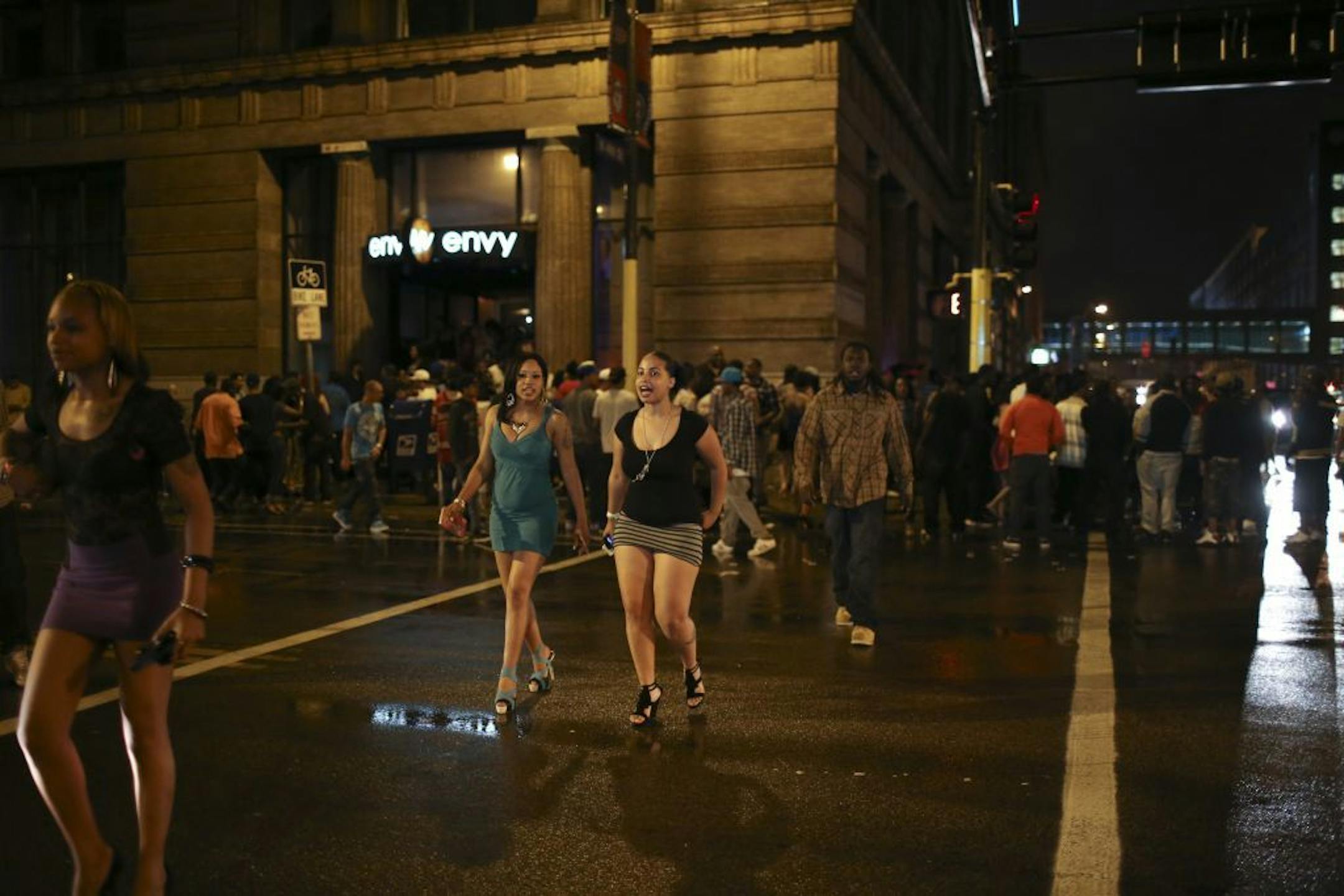 Minneapolis Police are saying that the crowds early Monday morning when the bars close at 2 a.m. are increasingly a problem at the intersection of First Ave. N. and 4th St. N. The scene outside Club Envy shortly after 2 a.m. Monday morning, May 28, 2012 as club goers dispersed into the rainy night.