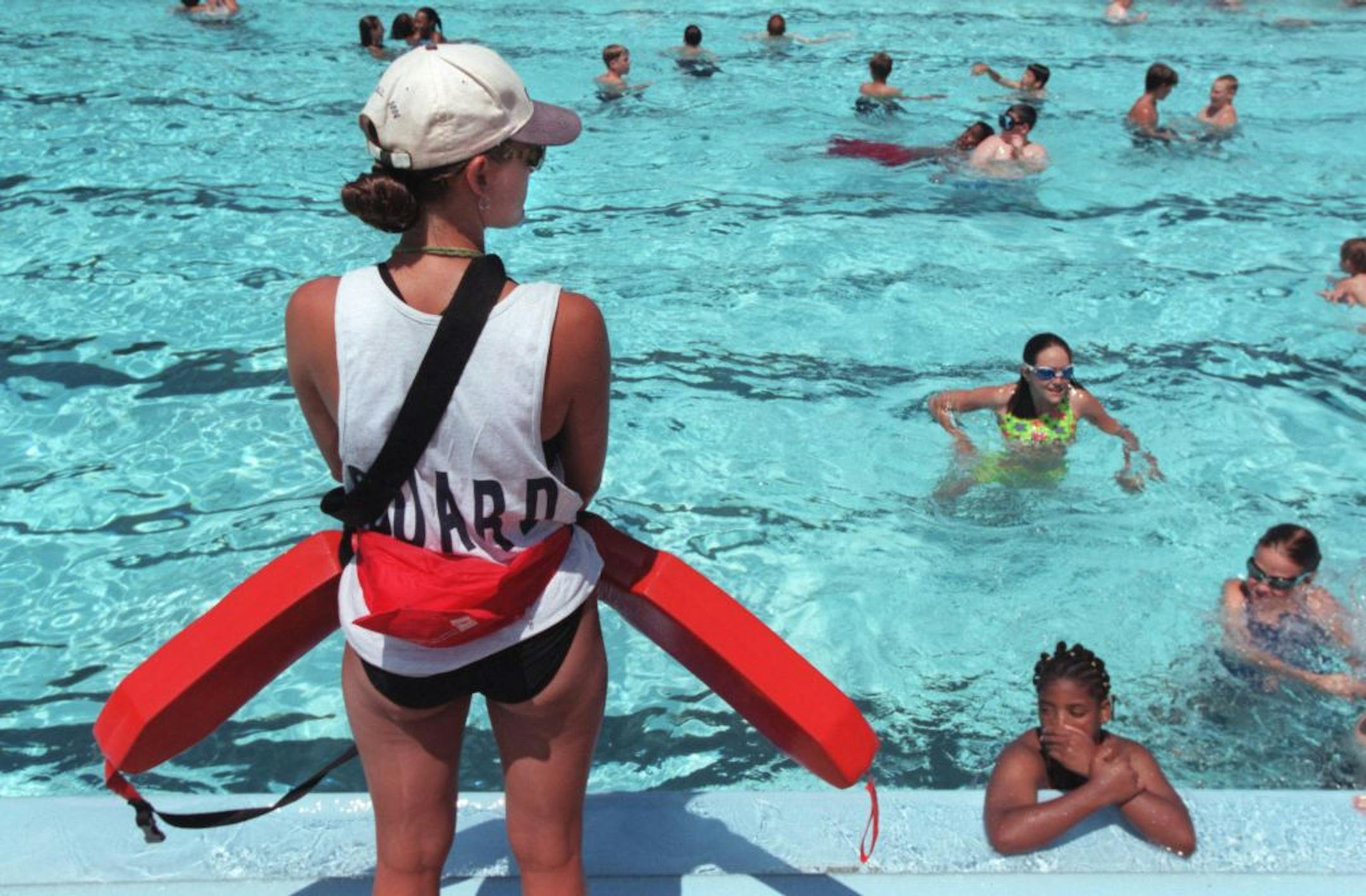 The life and times of a lifeguard at the busy Como Pool.