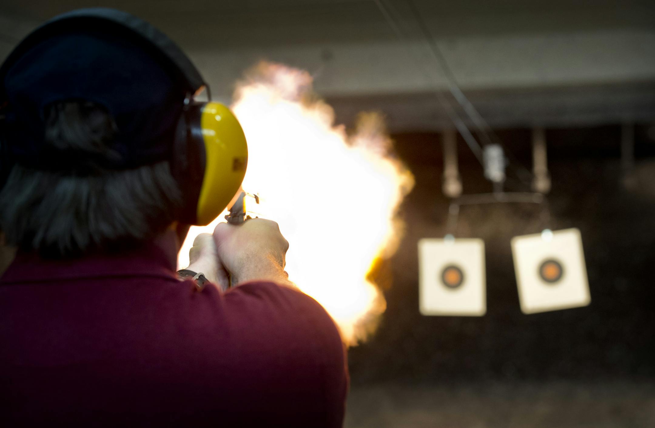 Peter Gauthier test fired a .357 at Bill's Gun Shop and Range in Robbinsdale which was busy Friday afternoon. Friday, July 19, 2013 ] GLEN STUBBE * gstubbe@startribune.com