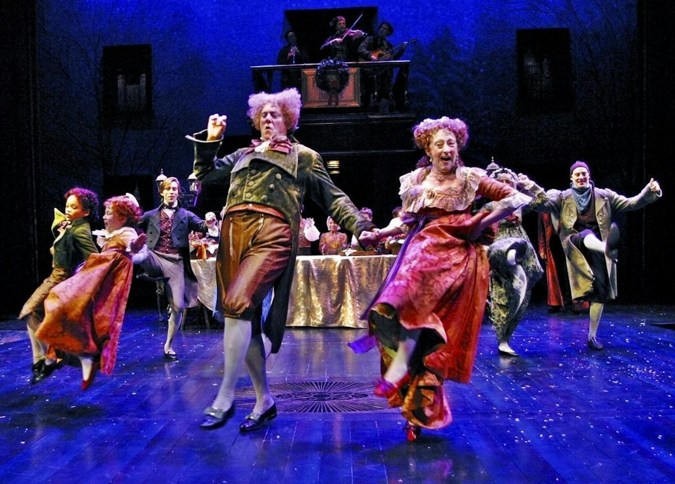 Richard Iglewski and Wendy Lehr with the company in the Guthrie Theater production of "A Christmas Carol"