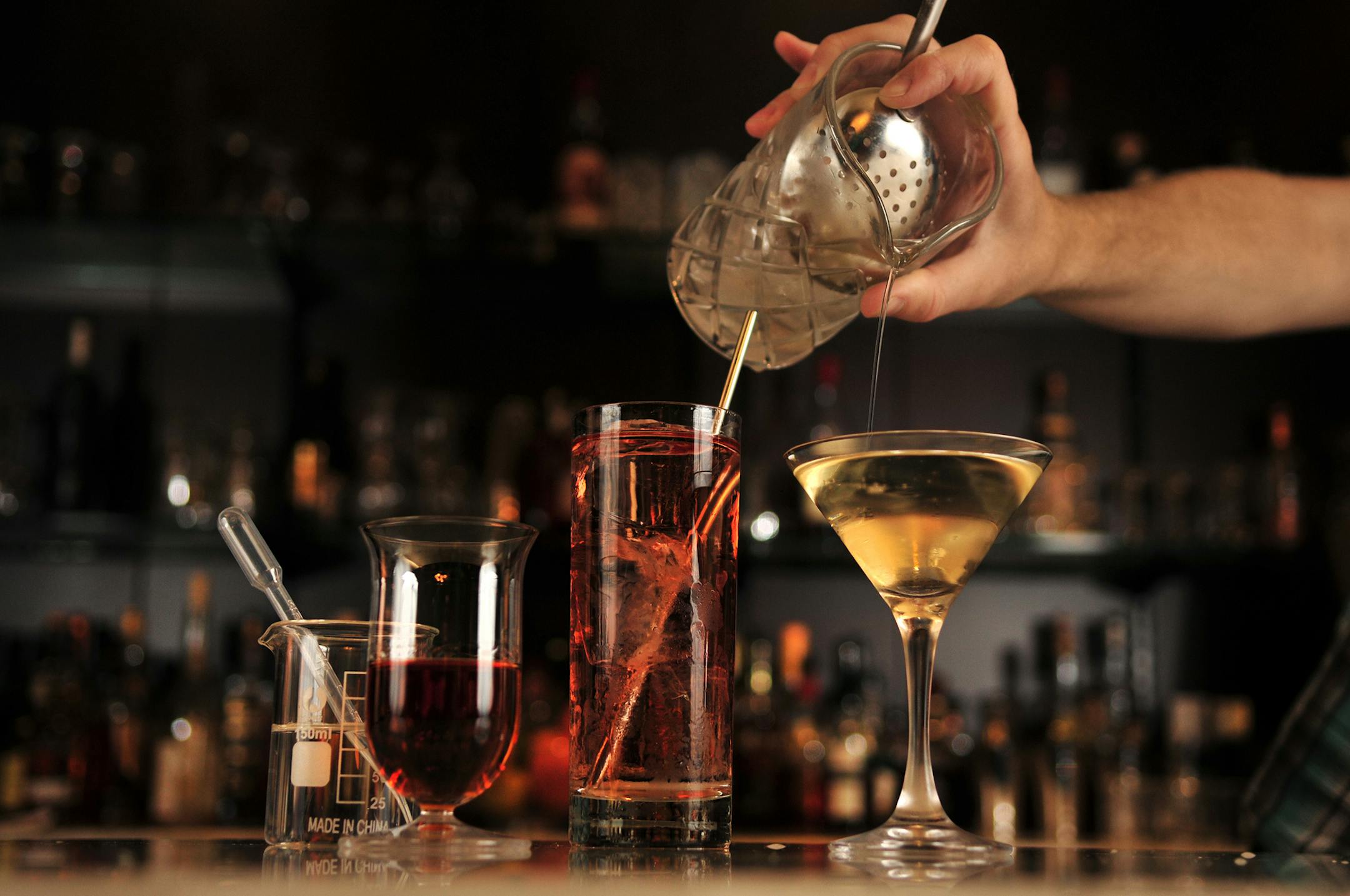 Marvel Bar's marvelous cocktails--poured whiskey with a side of distilled water, The Lady Killer, dry martini. ORG XMIT: MIN2013102919184573