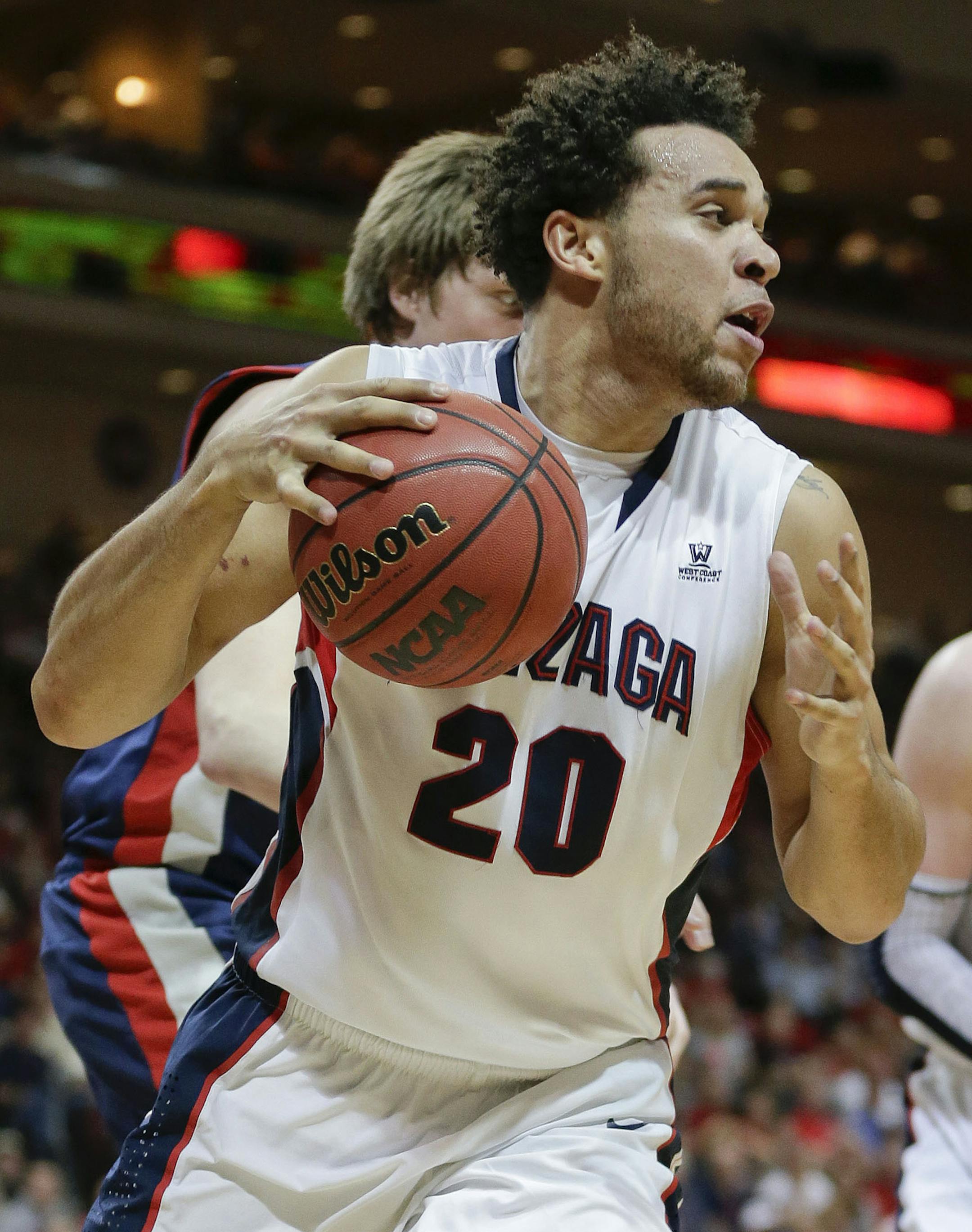 Gonzaga's Elias Harris looks to pass against St. Mary's during the first half of the West Coast Conference tournament championship NCAA college basketball game, Monday, March 11, 2013, in Las Vegas. (AP Photo/Julie Jacobson)