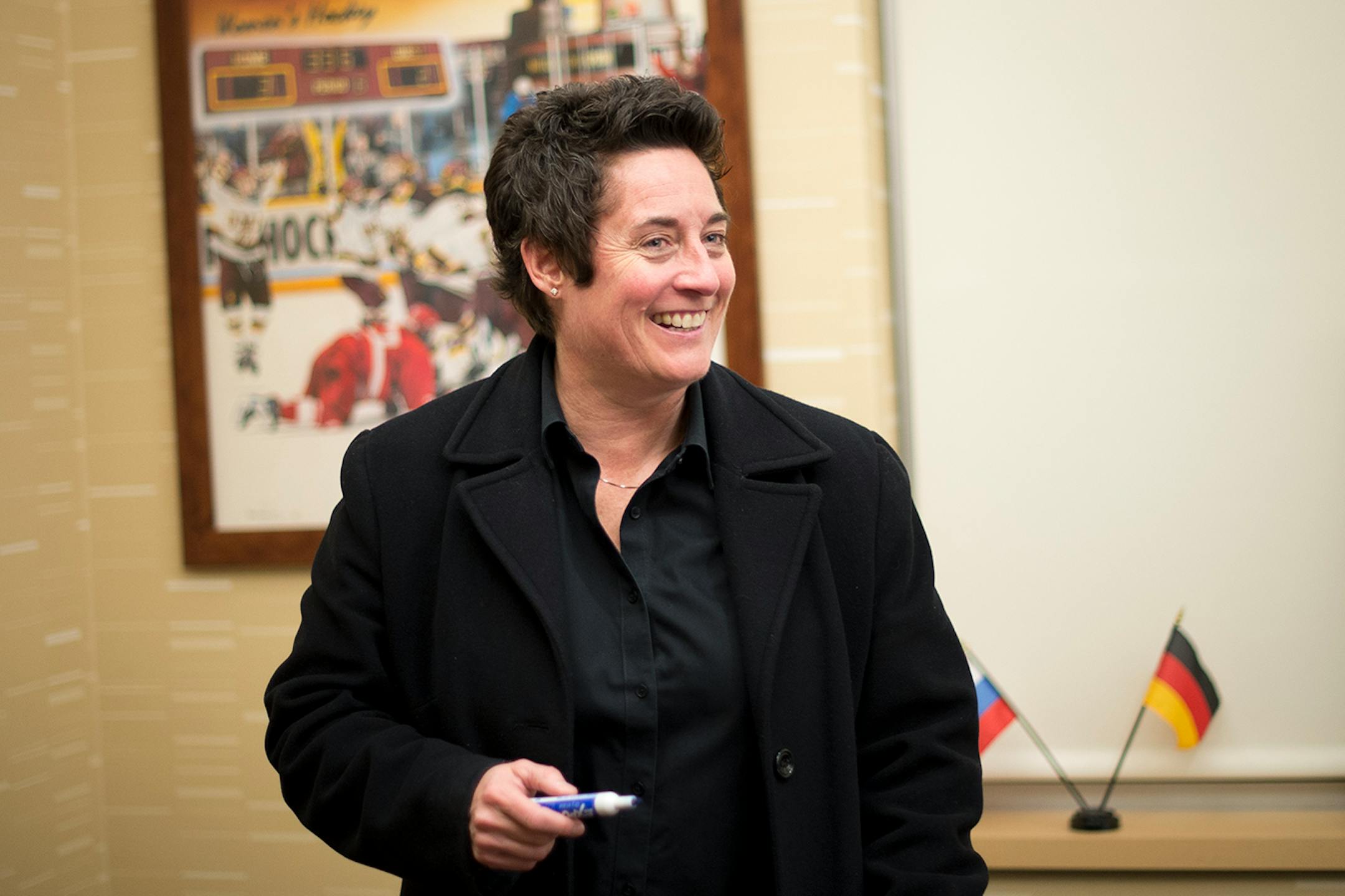University of Minnesota Duluth womens' hockey head coach Shannon Miller smiles while joking with her assistant coaches after Saturday night's loss to North Dakota. ] (Aaron Lavinsky | StarTribune) University of Minnesota Duluth told women's hockey head coach Shannon Miller that this season would be the las of her successful run as the Bulldog's coach. After five national championships, an NCAA record, and 11 Frozen Four Victories, Miller, the highest-paid coach in women's hockey, was told her co