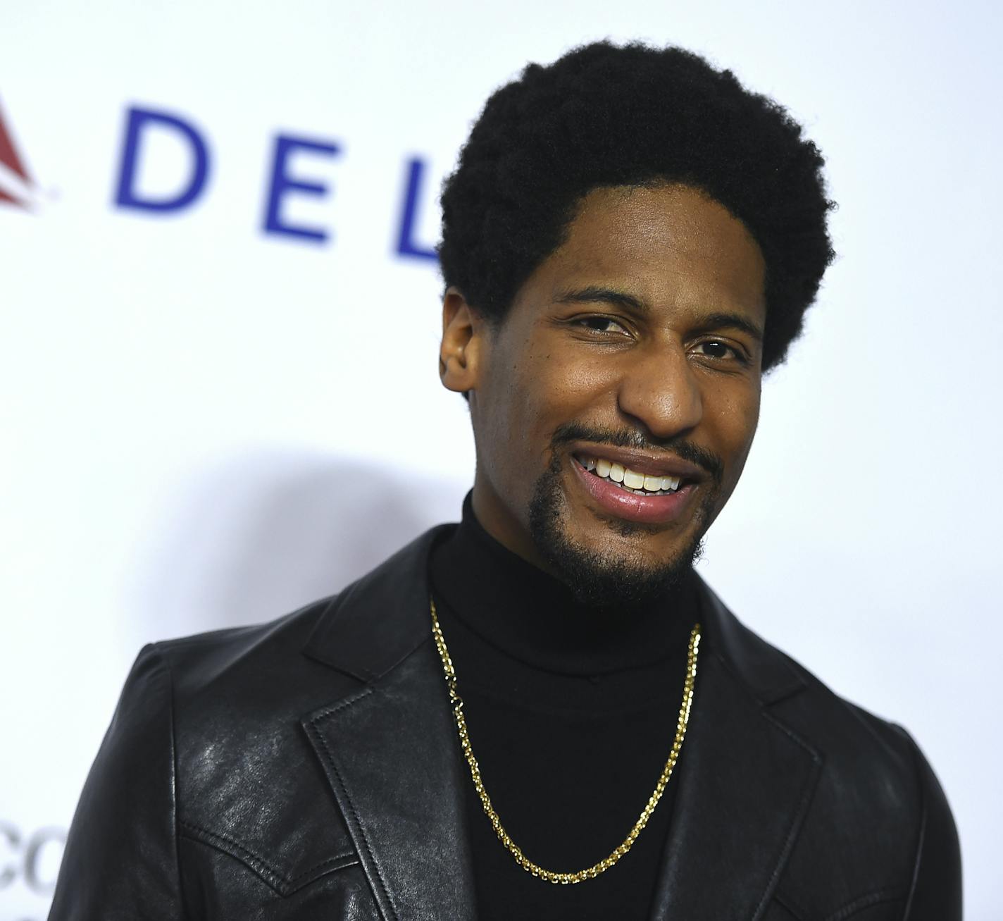 Jon Batiste arrives at MusiCares Person of the Year honoring Dolly Parton on Friday, Feb. 8, 2018, at the Los Angeles Convention Center. (Photo by Jordan Strauss/Invision/AP)