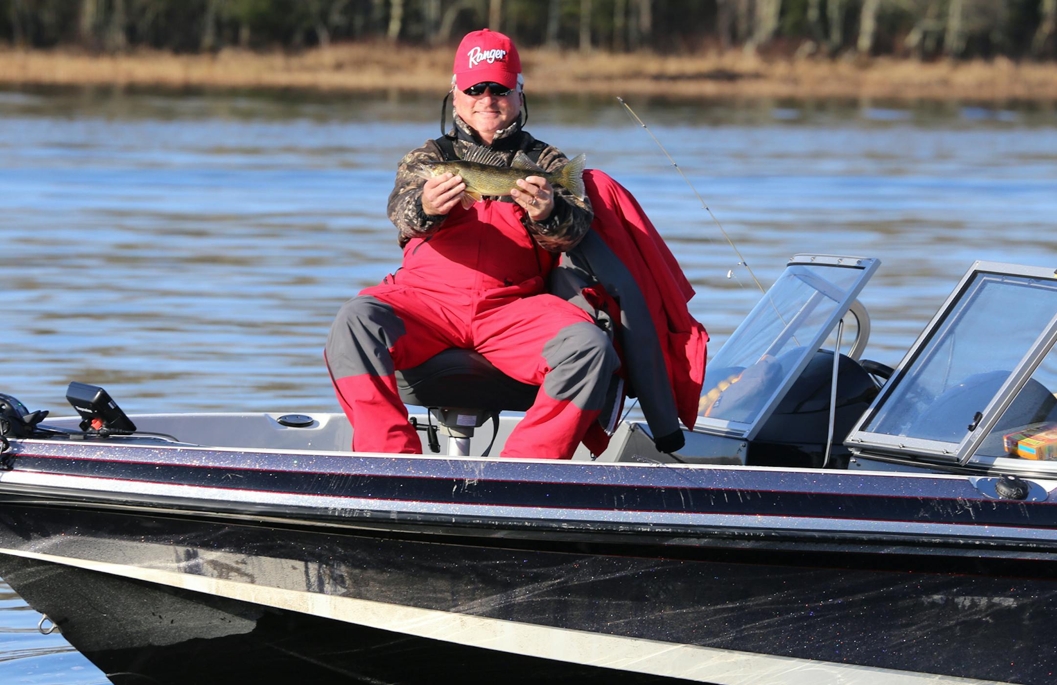 What Crane Lake anglers were looking for: Steve Vilks of Naples, Fla.,with a keeper walleye on Crane Lake, caught on the opener Saturday. Walleyes on Crane Lake under 17 inches can be kept.
