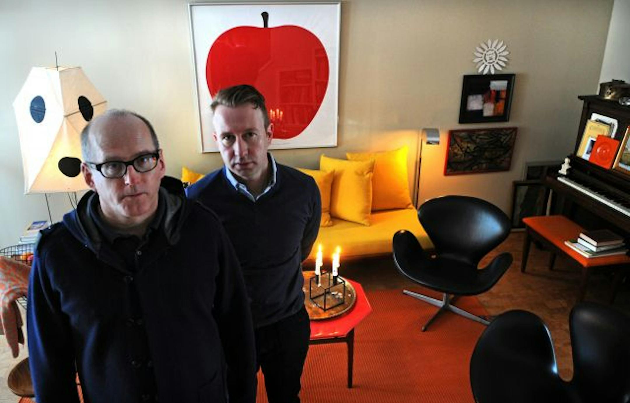 Jim Broberg and David Anger in their townhouse, which is decorated in retro mid-century modern style.