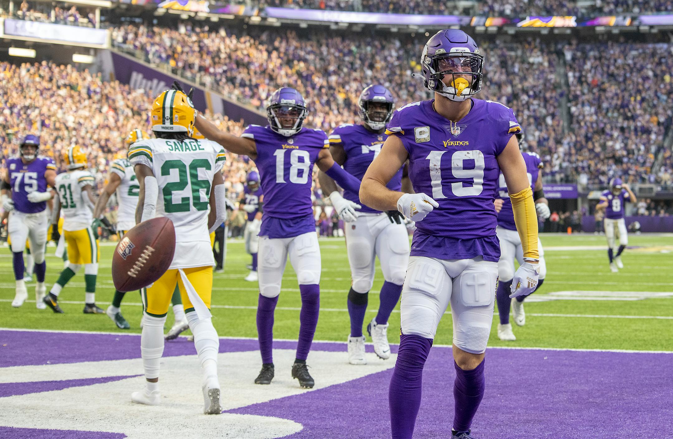 Minnesota Vikings wide receiver Adam Thielen (19) celebrates his touchdown during the second quarter of an NFL football game against the Green Bay Packers, Sunday, Nov. 21, 2021, in Minneapolis. (Elizabeth Flores/Star Tribune via AP)