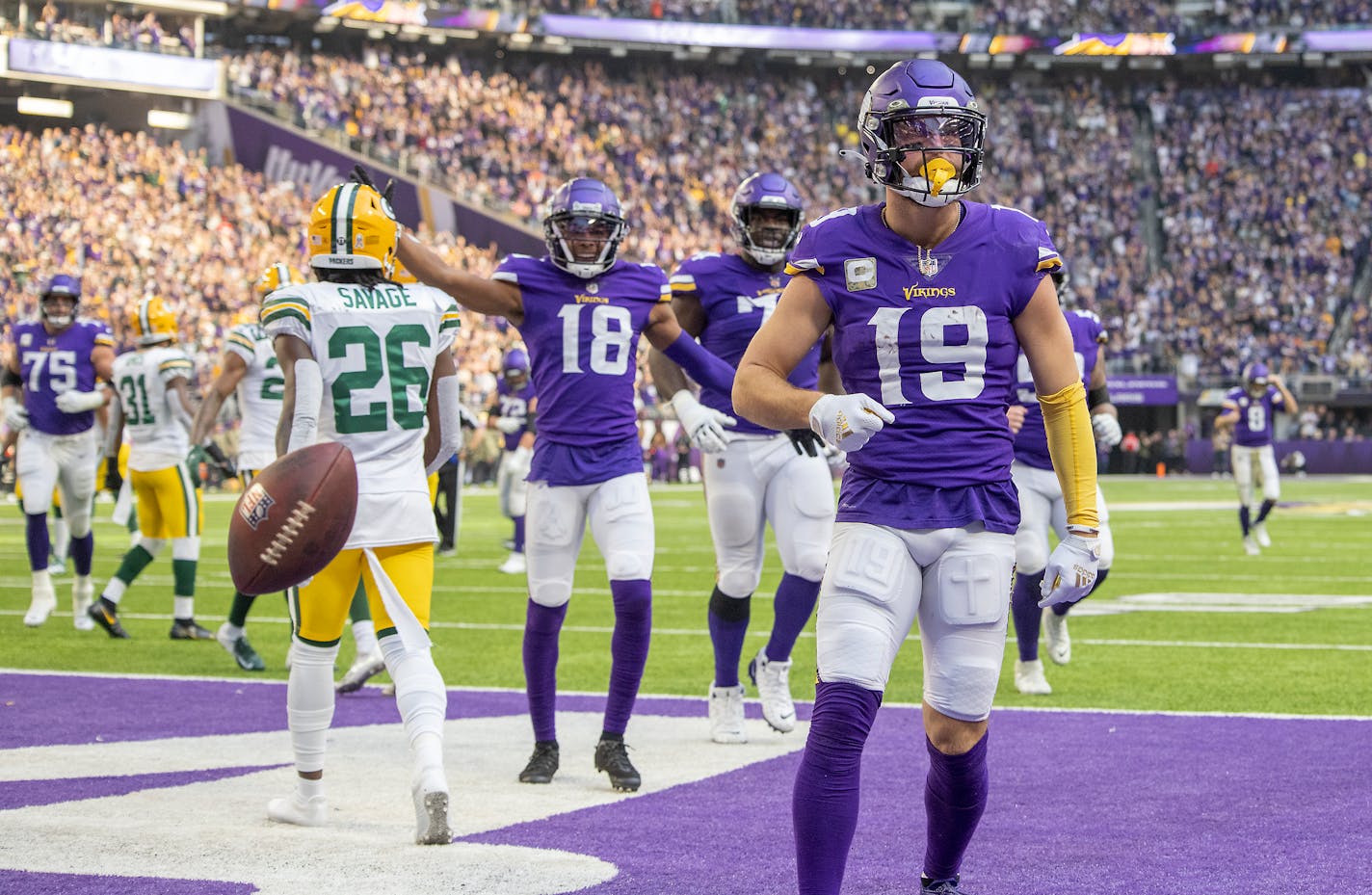 Minnesota Vikings wide receiver Adam Thielen (19) celebrates his touchdown during the second quarter of an NFL football game against the Green Bay Packers, Sunday, Nov. 21, 2021, in Minneapolis. (Elizabeth Flores/Star Tribune via AP)