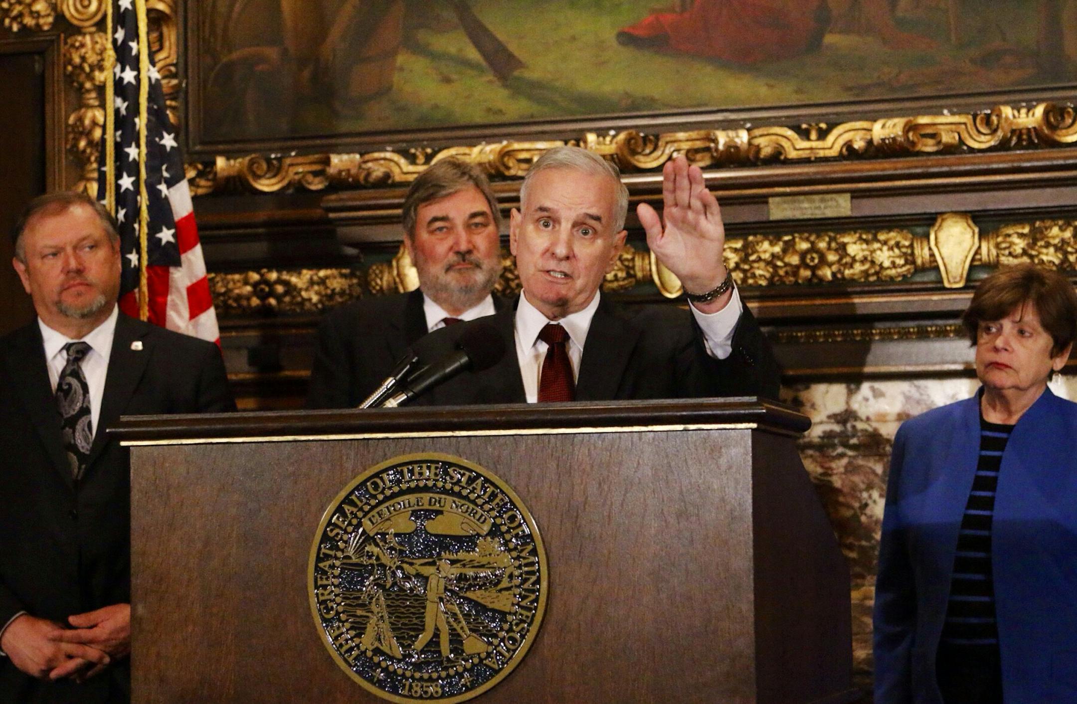 Governor Dayton with senators Bakk (left) and Rest right. Senator rod skoe behind Dayton. ] BRIAN PETERSON/STAR TRIBUNE