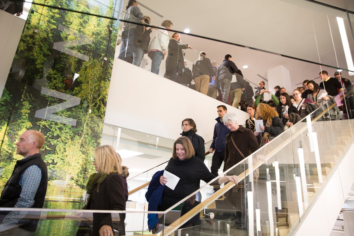 Star Tribune employees tour the new offices inside the Capella Tower in downtown Minneapolis on Thursday, March 5, 2015. ] LEILA NAVIDI leila.navidi@startribune.com /