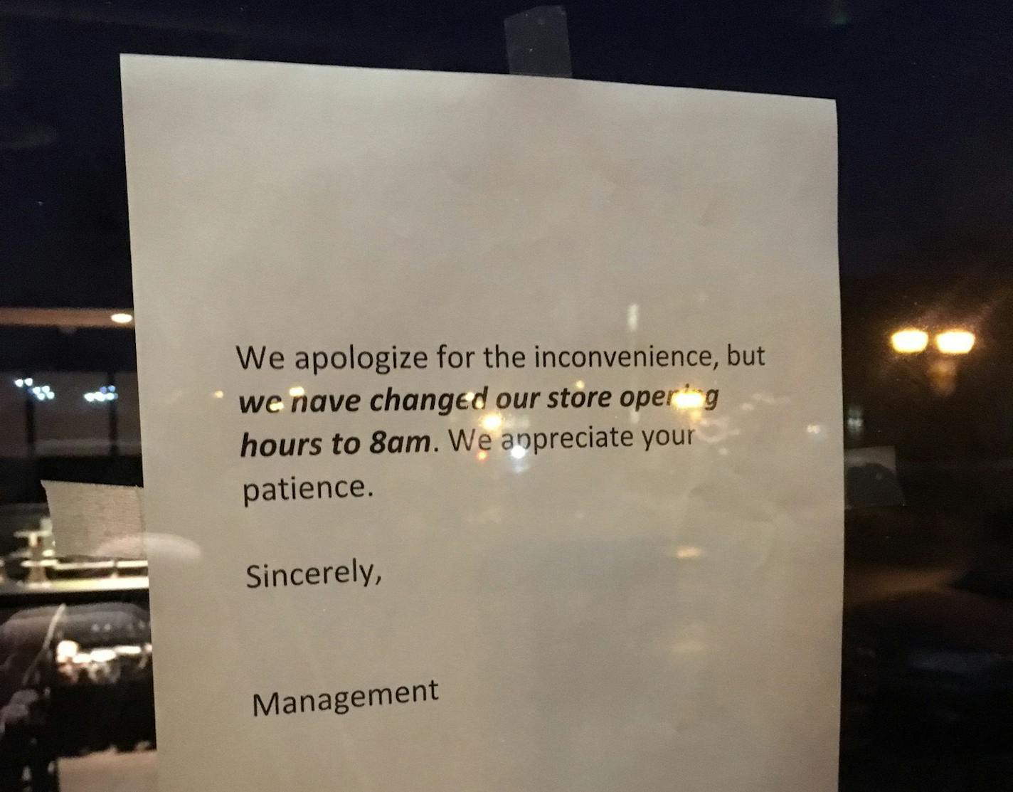 Customers were greeted with this sign announcing new opening hours on Friday, Jan. 20, at the Starbucks in Dinkytown at Fifth Street and 14th Avenue SE.