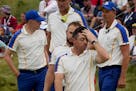 Team Europe's Rory McIlroy reacts after their loss to Team USA during the Ryder Cup at the Whistling Straits Golf Course Sunday, Sept. 26, 2021, in Sh