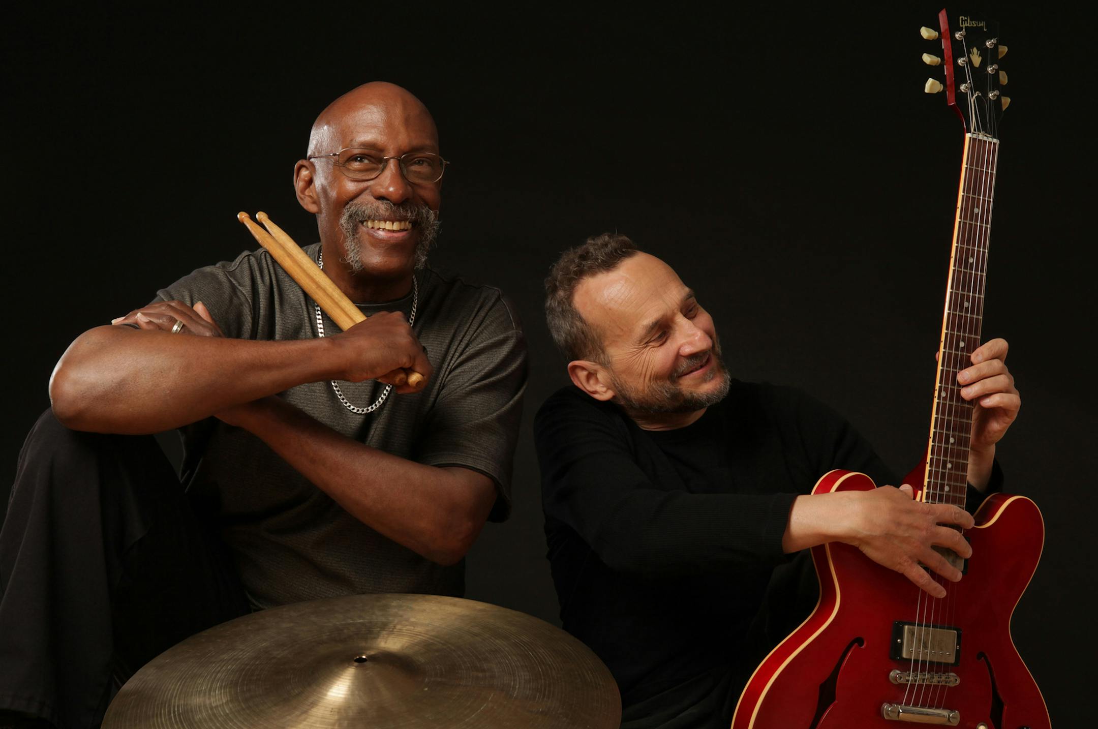 Red House Records Drummer Eric Kamau Gravatt and guitarist Dean Magraw.