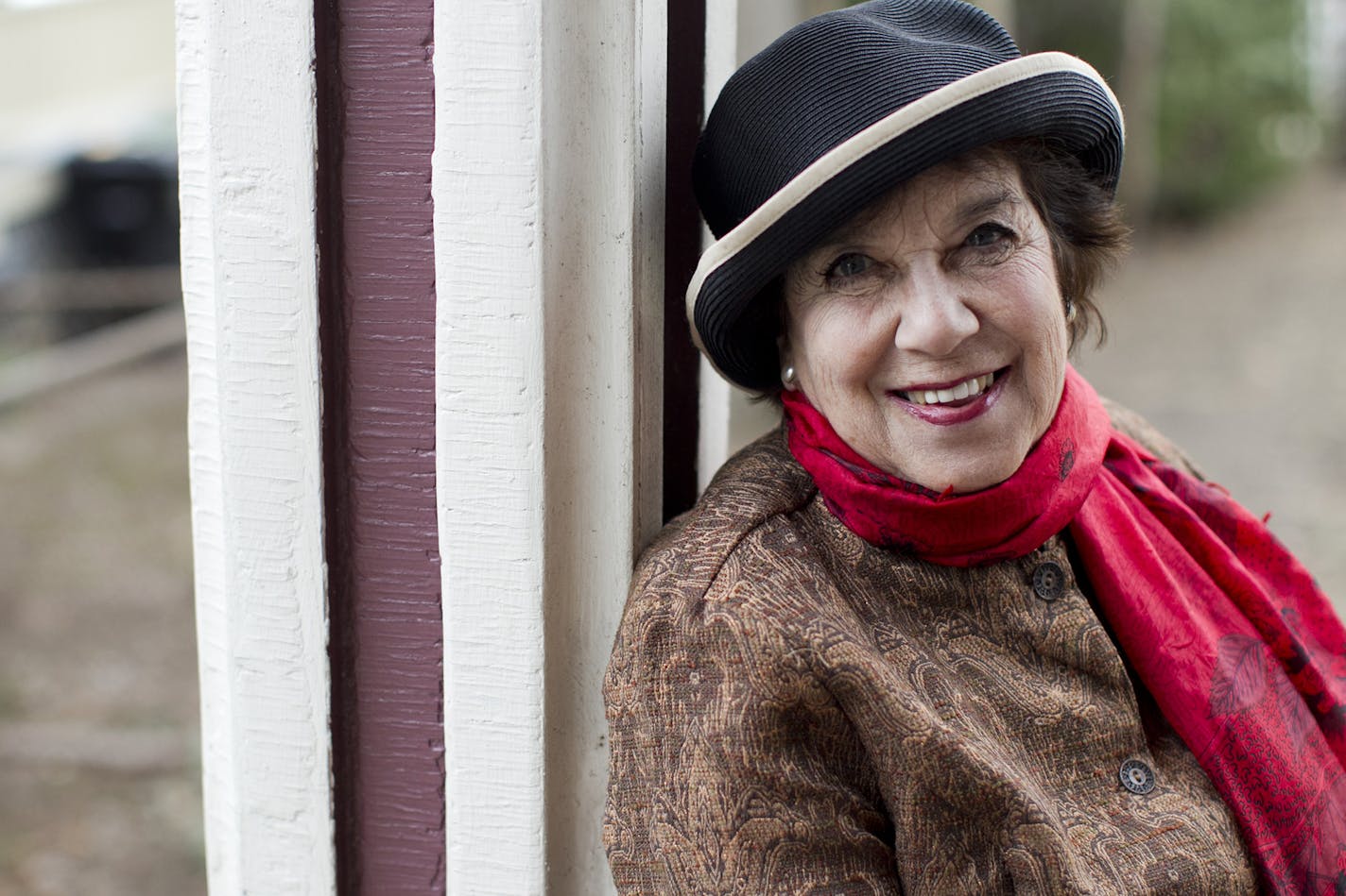 Kathleen Spivack poses for a portrait at her home. Photo by Dominick Reuter.