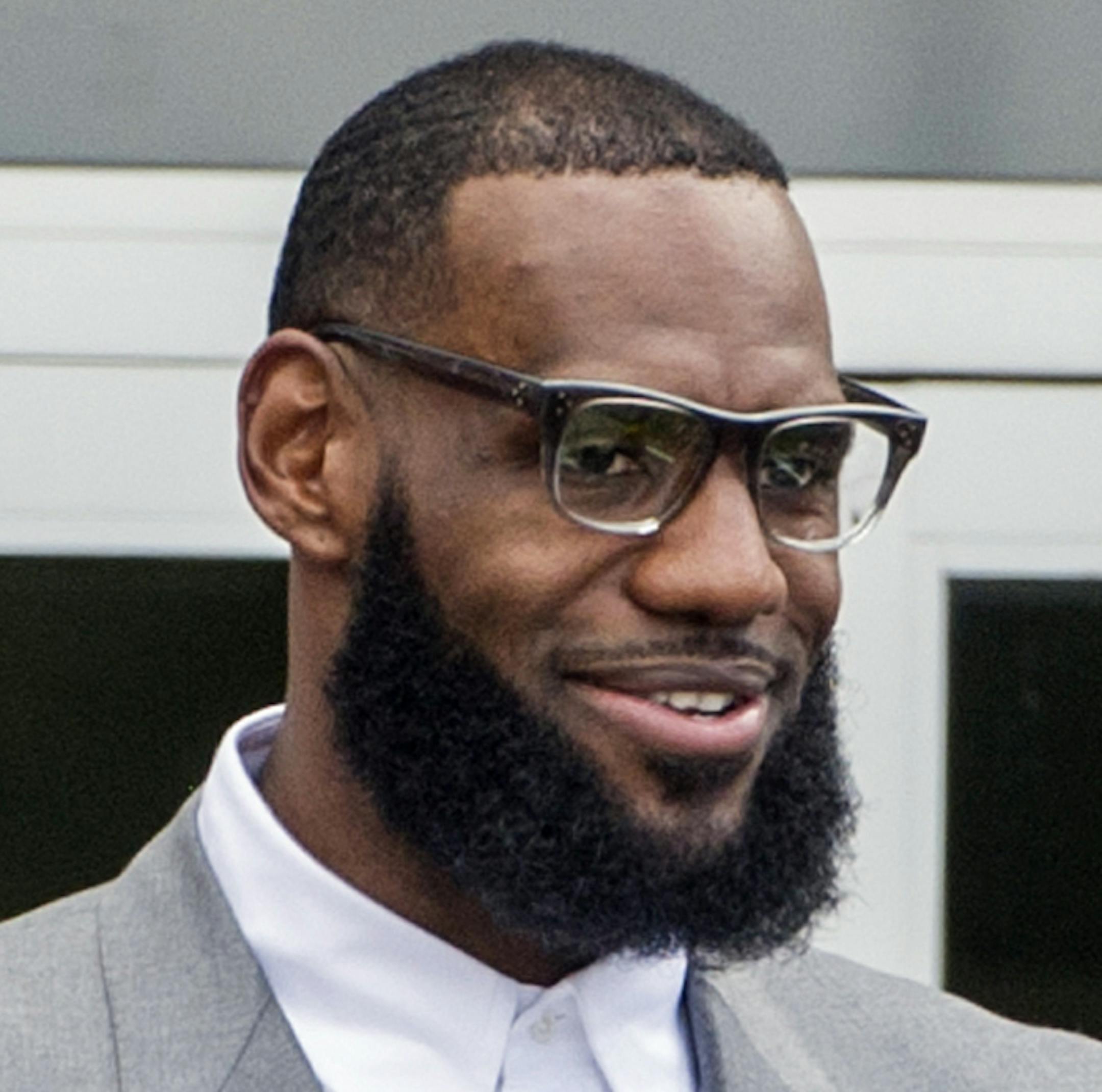 FILE - In this Monday, July 30, 2018, file photo, LeBron James speaks at the opening ceremony for the I Promise School in Akron, Ohio. James has yet to play a minute for the Los Angeles Lakers, yet the NBA superstar is churning out content for the small screen. James is behind the three-part documentary series "Shut Up and Dribble" announced Monday, Aug. 6, 2018, by Showtime. (AP Photo/Phil Long, File)