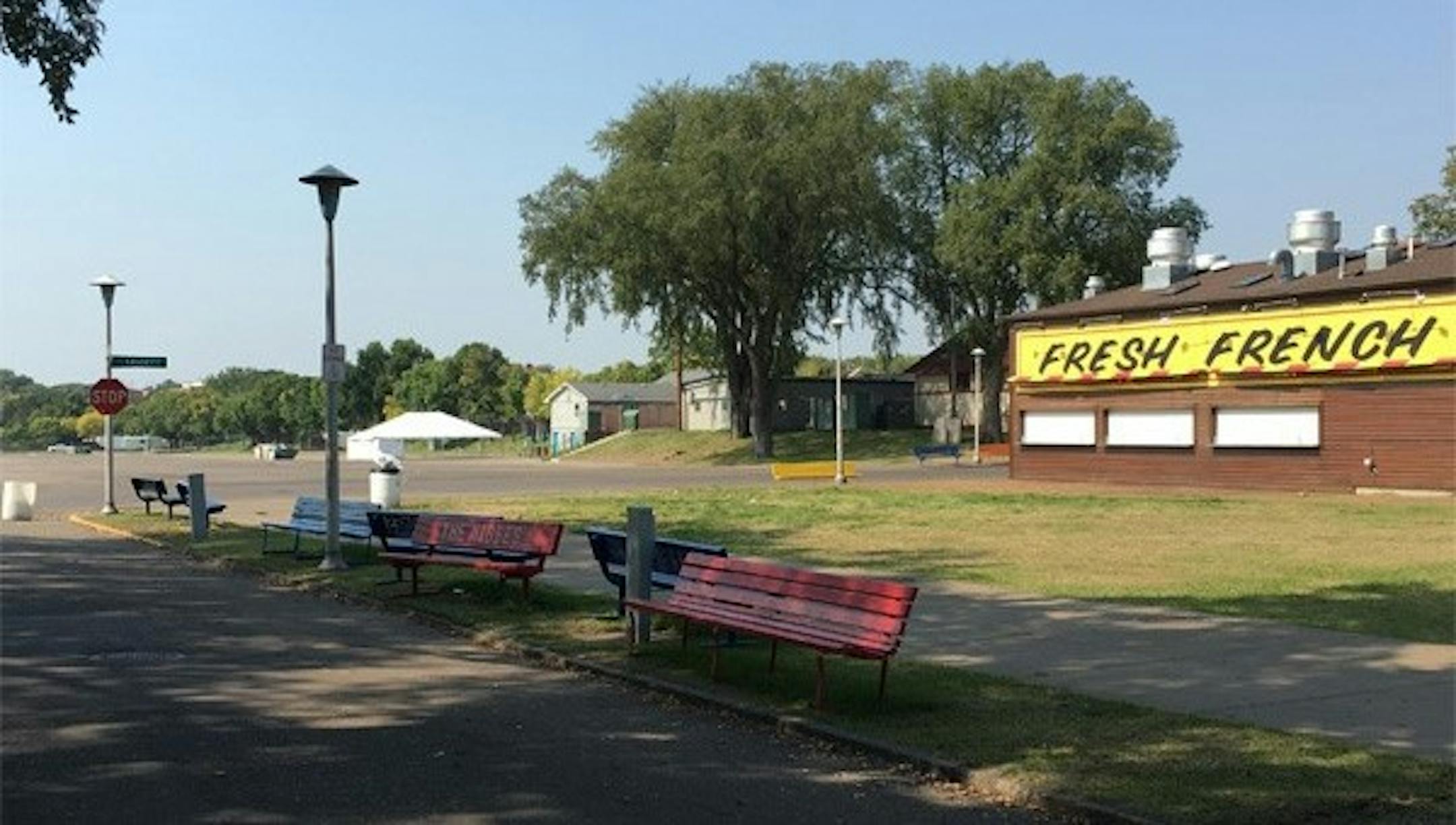 The benches are empty, and there are no fries.