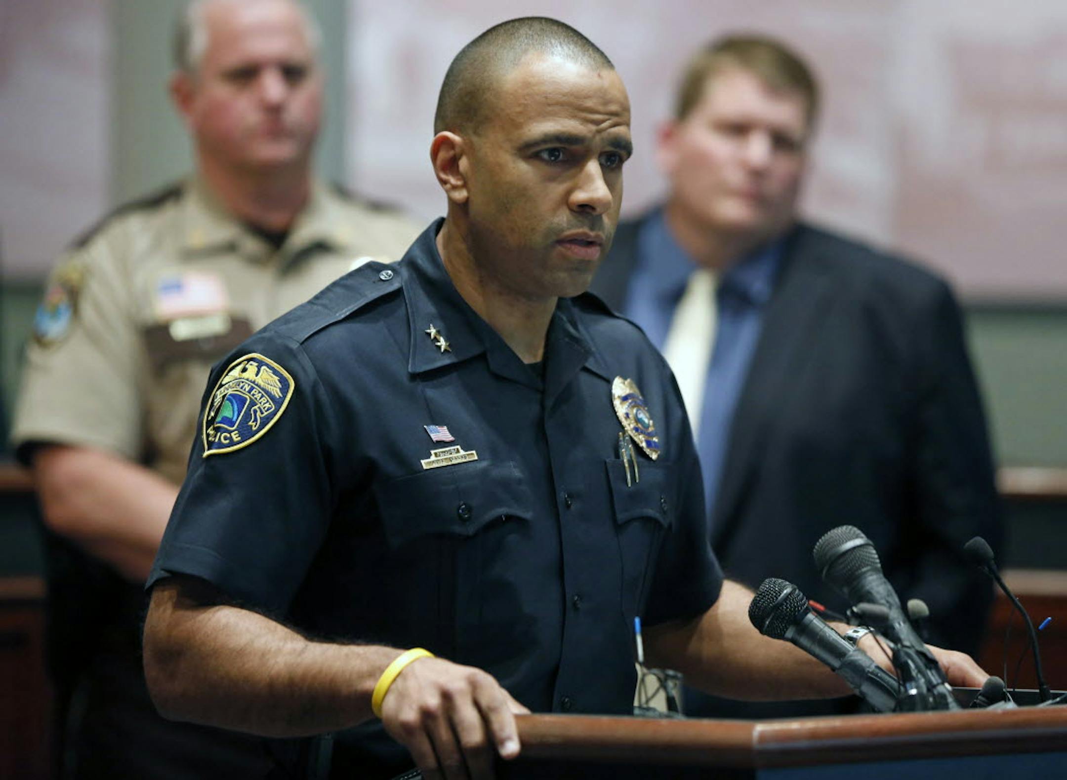 Brooklyn Park Police Chief Michael Davis discussed the homicide arrest of Eddie Matthew Mosley, left, which he said was the result of a combined effort among 30 investigators from law enforcement agencies in Minnesota and Missouri.