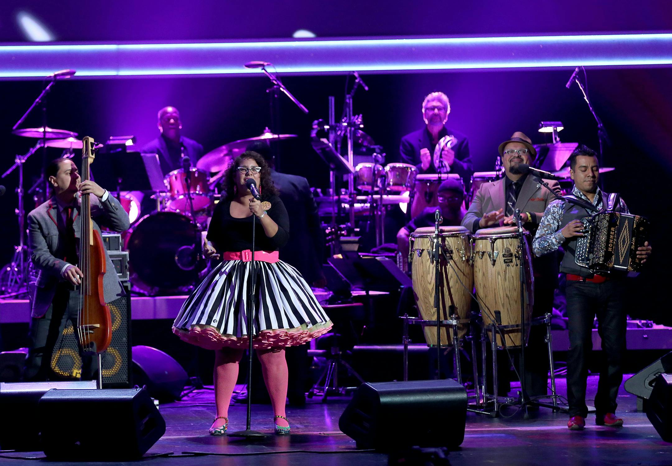 La Marisoul of La Santa Cecilia performs at the pre-telecast of the 56th annual GRAMMY Awards on Sunday, Jan. 26, 2014, in Los Angeles. (Photo by Matt Sayles/Invision/AP) ORG XMIT: INVW