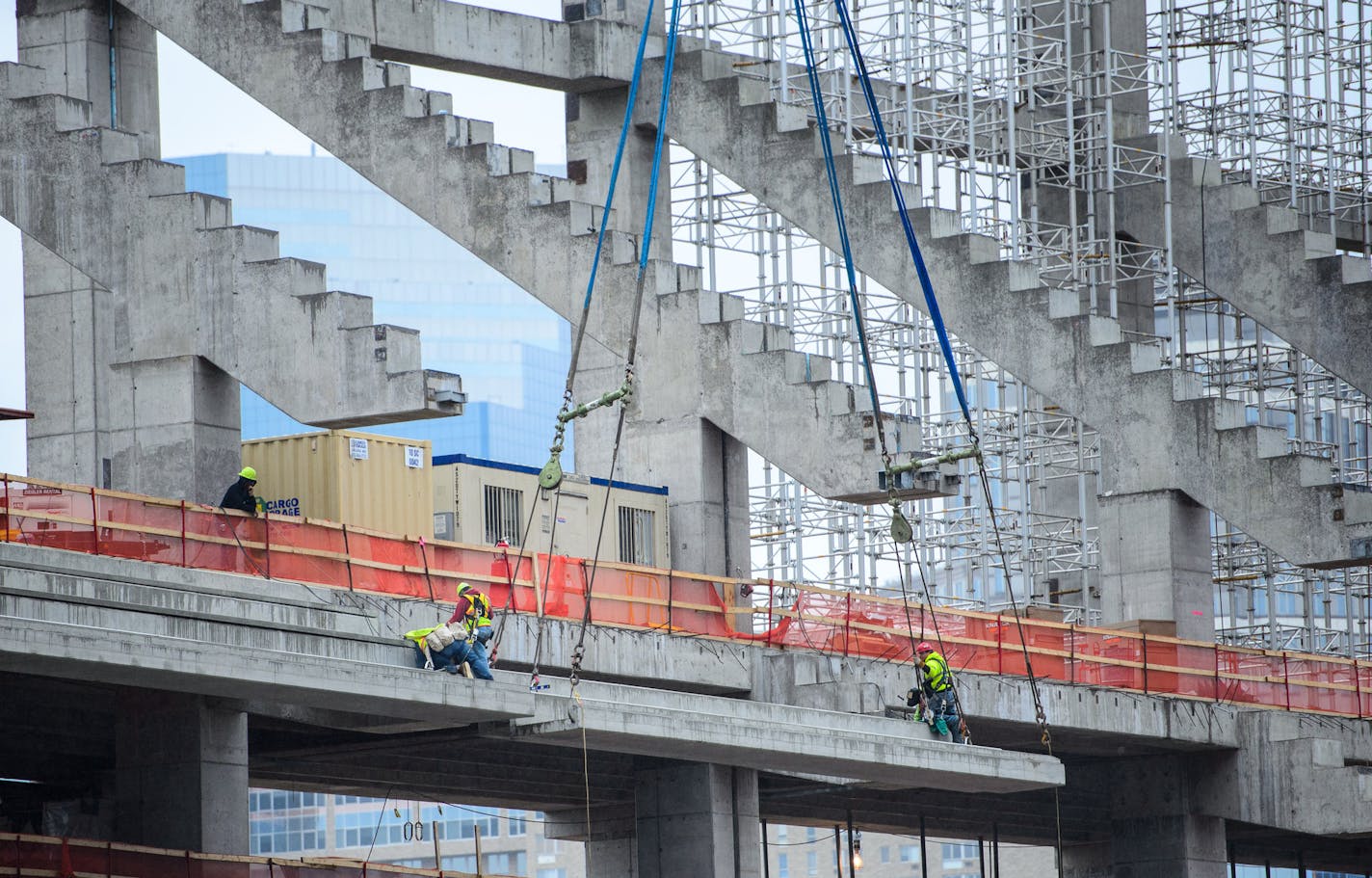 A concrete seating section panel is moved into position in the new Vikings stadium. ] GLEN STUBBE * gstubbe@startribune.com Thursday, May 14, 2015 Construction update of the new Vikings stadium, Minneapolis, MN