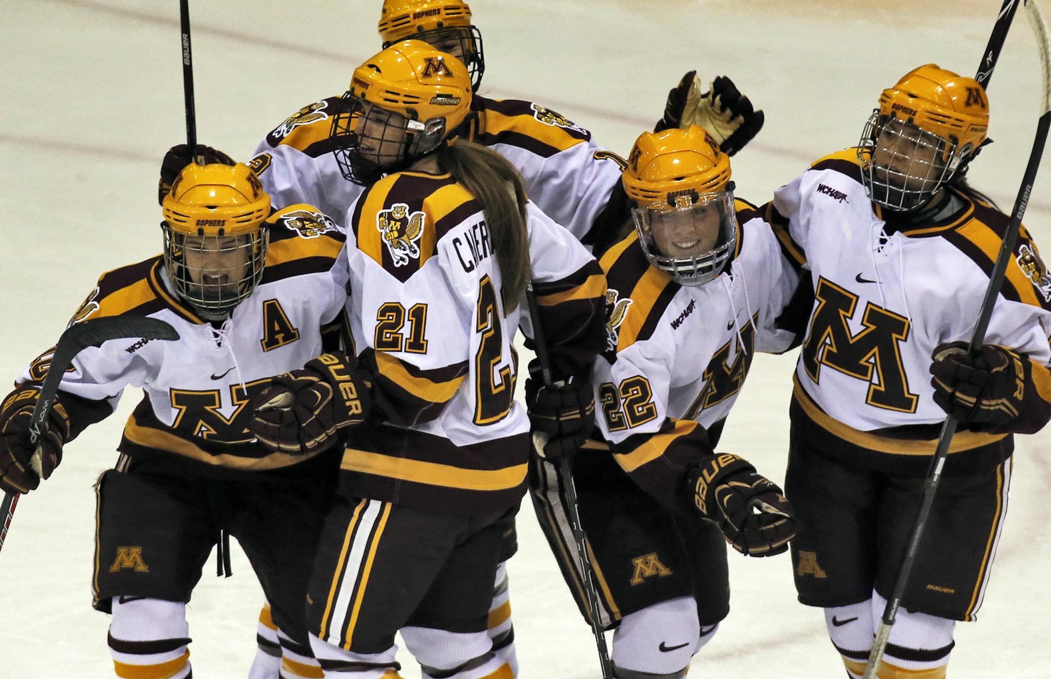 Minnesota Gophers womens hockey game vs. Wisconsin. Gophers celebrated a first period goal. . (MARLIN LEVISON/STARTRIBUNE(mlevison@startribune.com)