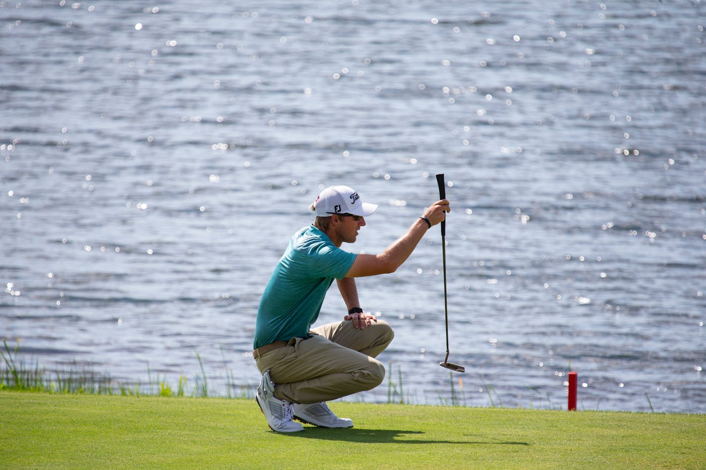 Richy Werenski lines up a birdie putt on the 14th hole during the final round of the 3M Open golf tournament in Blaine, Minn., Sunday, July 26, 2020. (AP Photo/Andy Clayton-King)