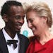Barkhad Abdi, winner of best supporting actor, and Emma Thompson pose for photographers in the winners room at the EE British Academy Film Awards on S