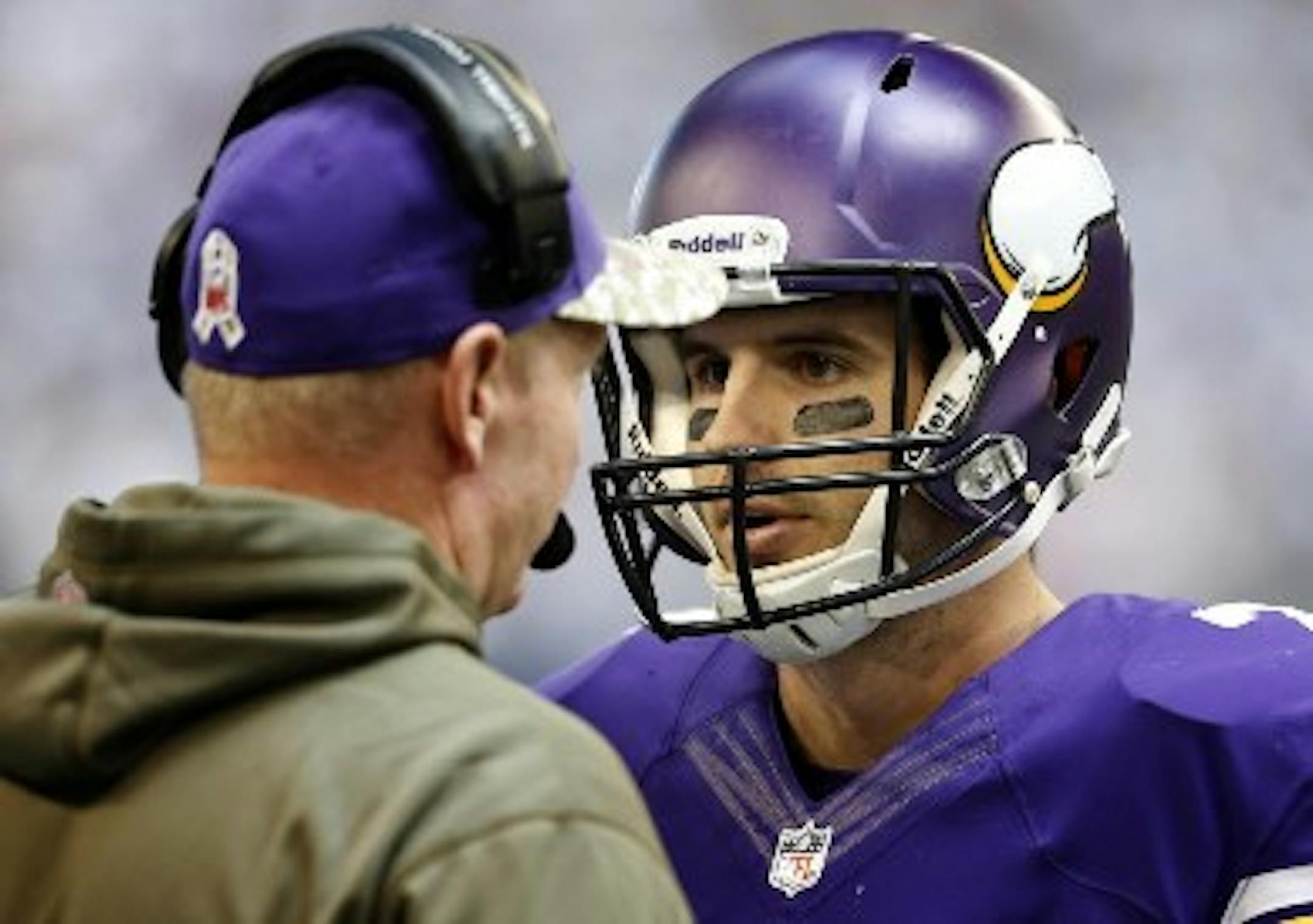 Former Vikings quarterback Christian Ponder, right, and offensive coordinator Bill Musgrave are now with Oakland and return to Minneapolis on Saturday for a preseason game against the Vikings