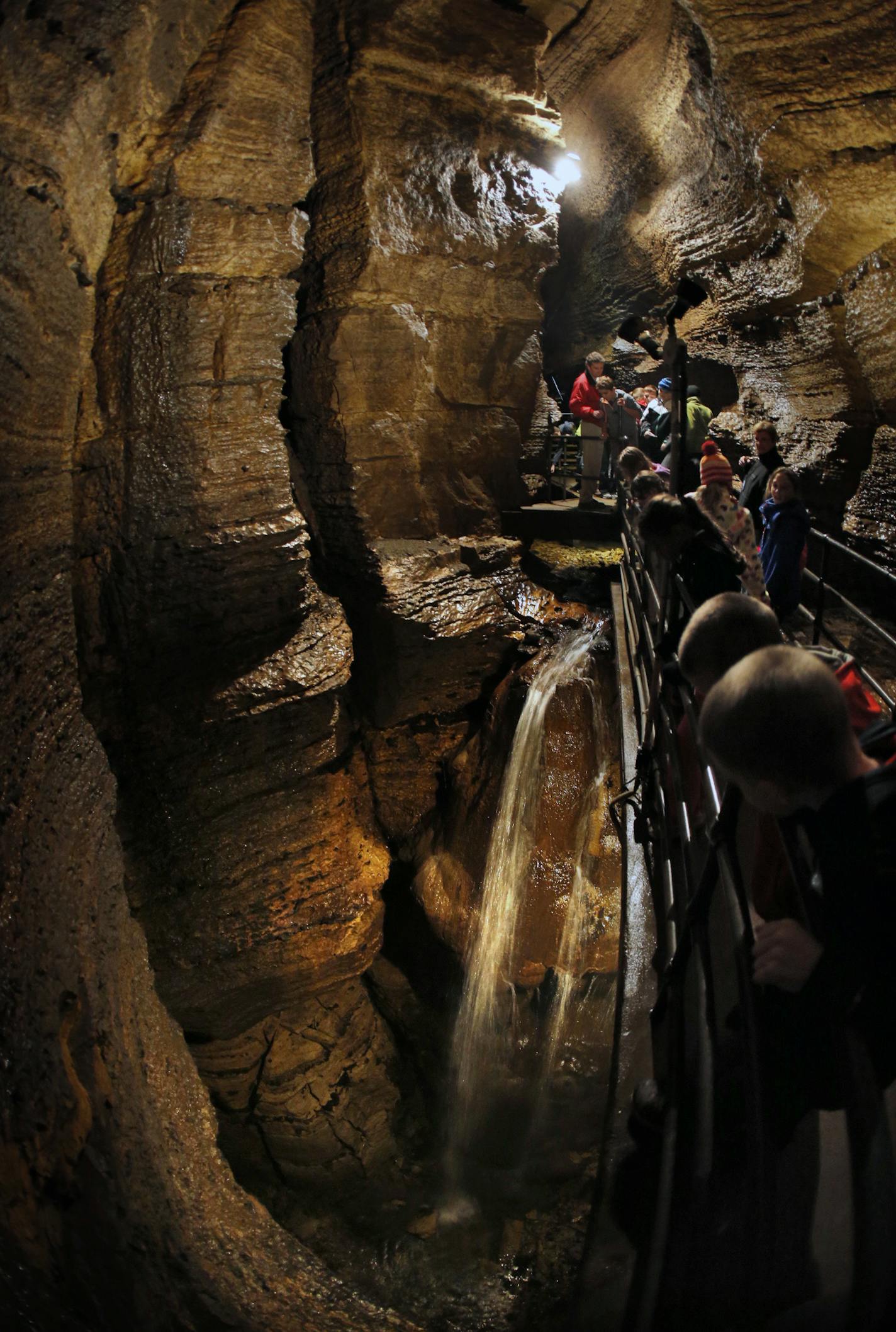 Schoolchildren explored the depths of Niagara Cave south of Harmony, Minn., including this 60-foot underground waterfall.