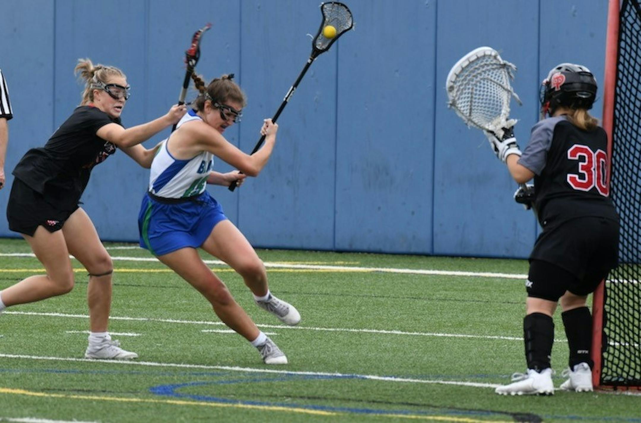 Blake attacker Erin Lee works her way to the goal in a 15-10 victory over Eden Prairie on 5/22/2021