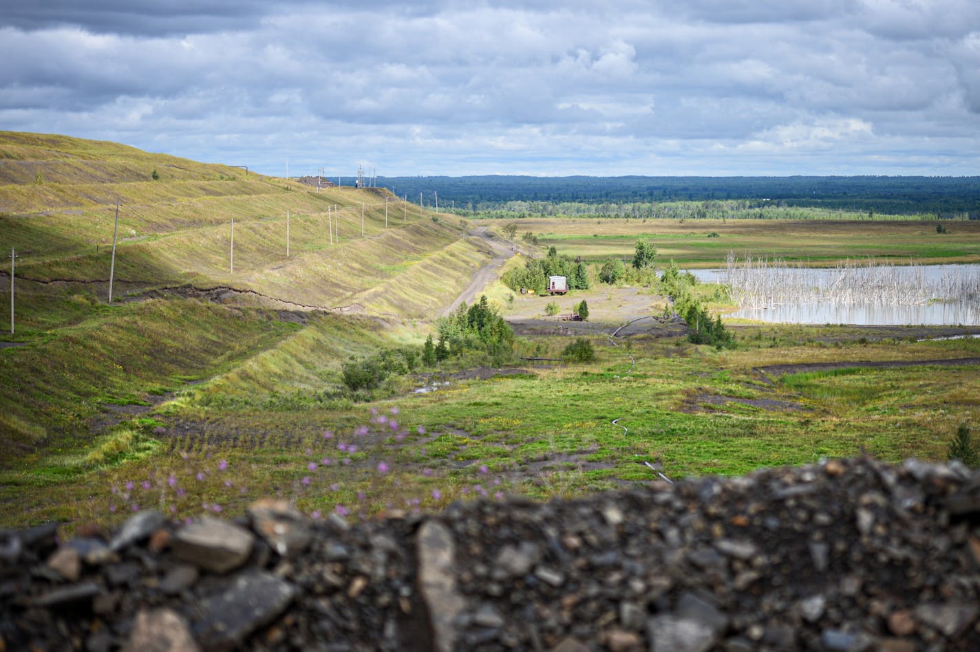 Once work begins at PolyMet mine near Hoyt Lakes, Minnesota, this tailings basin will be put back into use. Tailings, rock that does not contain ore is pumped in a a slurry mixture and deposited in the tailings basin. Water will be recycled and reused. ] GLEN STUBBE • glen.stubbe@startribune.com Wednesday, August 20, 2014 EDS, this is the one vantage point PolyMet allows visitors.FOR USE WITH ANY APPROPRIATE STORY