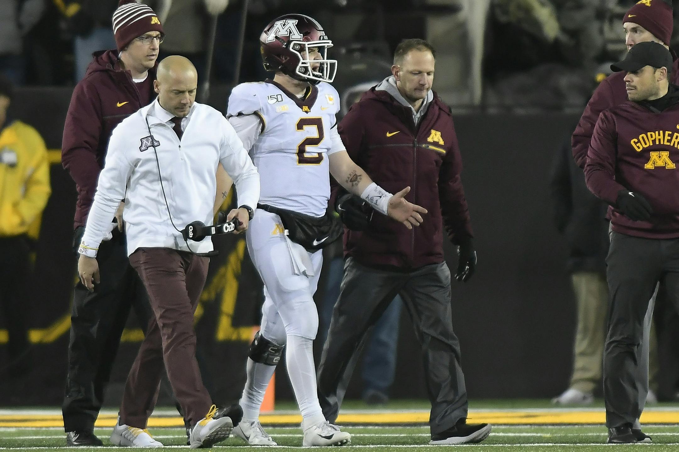 Gophers coach P.J. Fleck and quarterback Tanner Morgan walked off the field after Morgan was injured on the final drive of last Saturday's loss at Iowa.