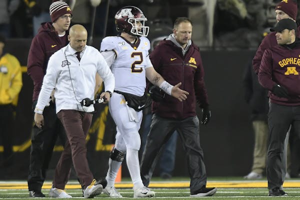 Gophers coach P.J. Fleck and quarterback Tanner Morgan walked off the field after Morgan was injured on the final drive of last Saturday's loss at Iow