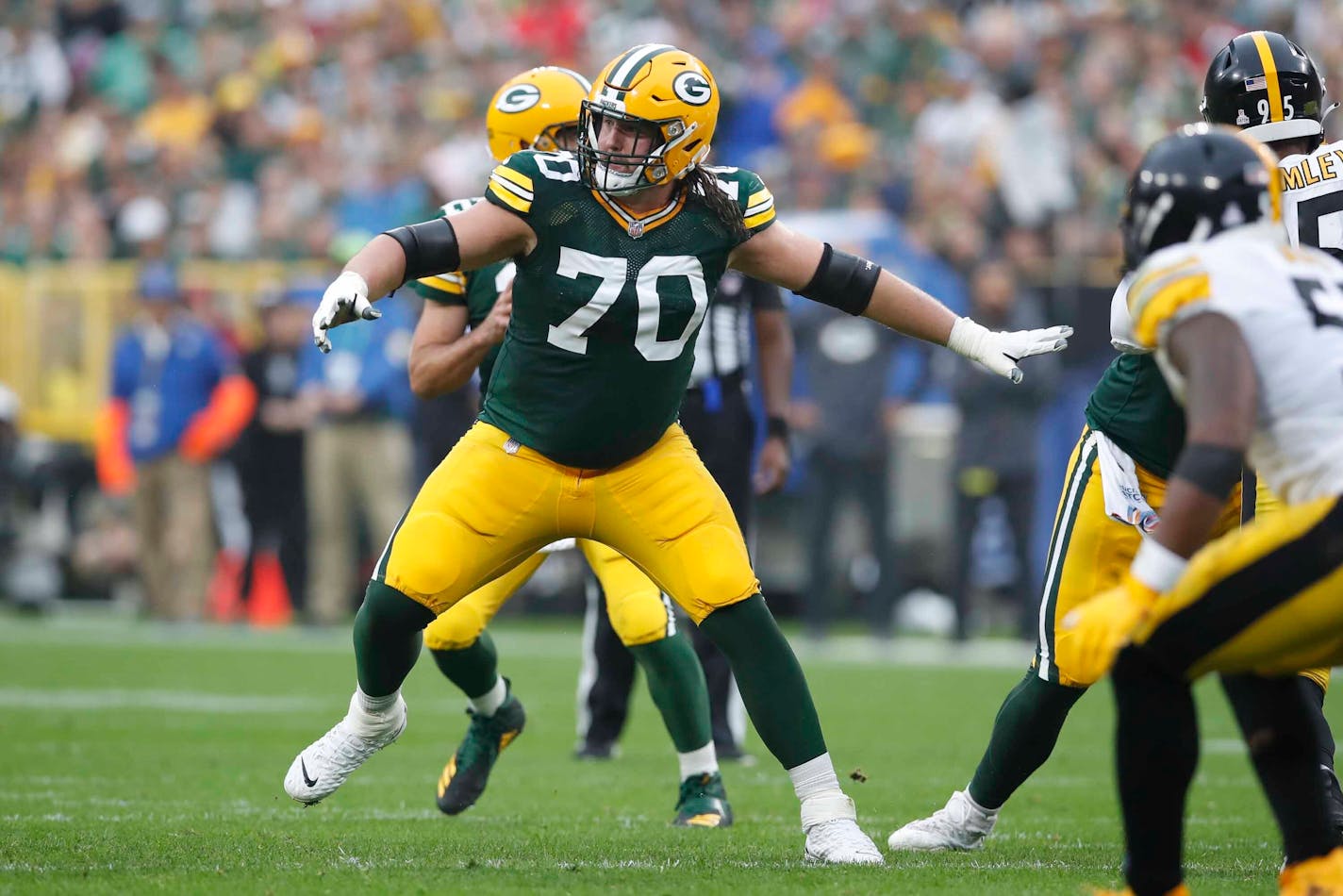 Green Bay Packers guard Royce Newman (70) set to block against the Pittsburgh Steelers during an NFL football game Sunday, Oct 3. 2021, in Green Bay, Wis. The Packers won the game 27-17. (Jeff Haynes/AP Images for Panini)