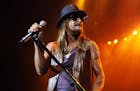 FILE - This Dec. 30, 2012 file photo shows Kid Rock performing at the Seminole Hard Rock Hotel & Casinos' Hard Rock Live! in Hollywood, Fla. Kid Rock 
