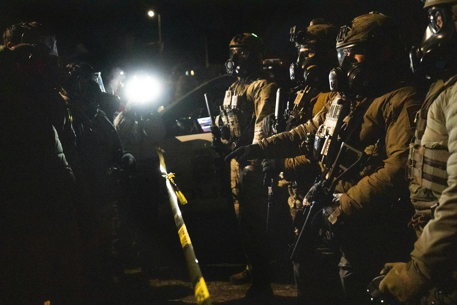 Protesters clash with ICE agents over the non-fatal shooting of a man in North Minneapolis on Jan. 14.