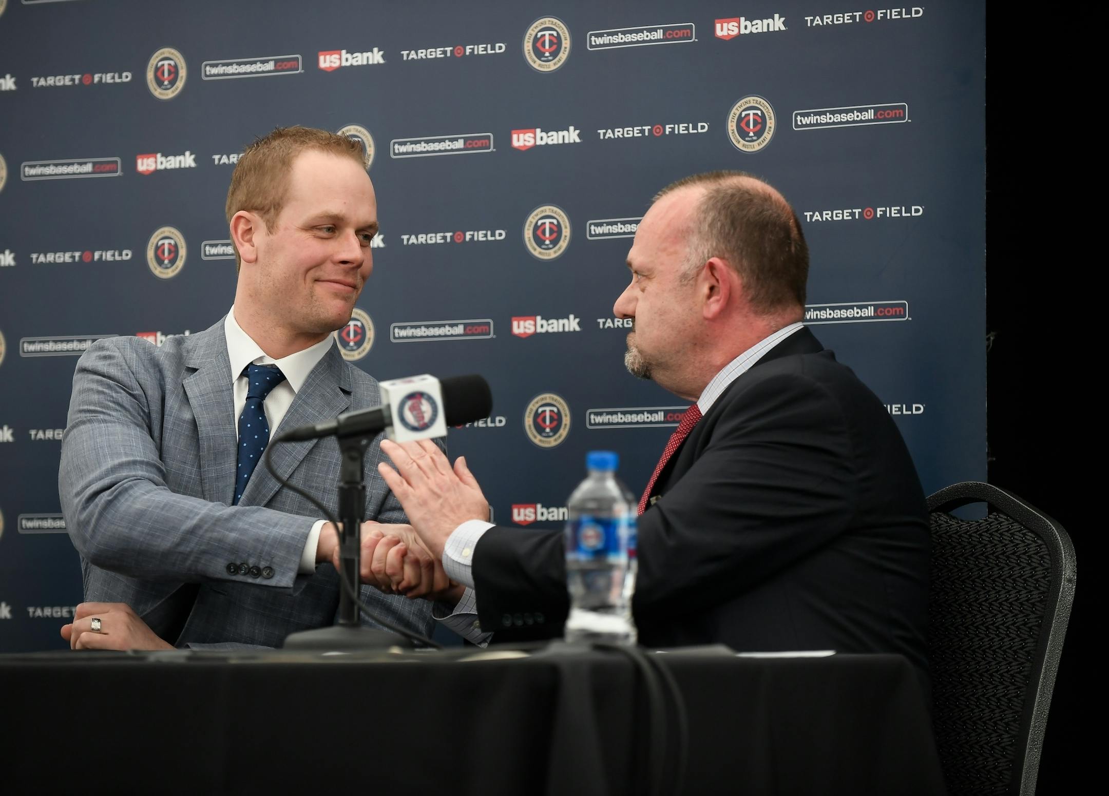 Former Twins first baseman Justin Morneau shook hands with Twins President Dave St. Peter after St. Peter made remarks at Morneau's retirement press conference Wednesday afternoon.