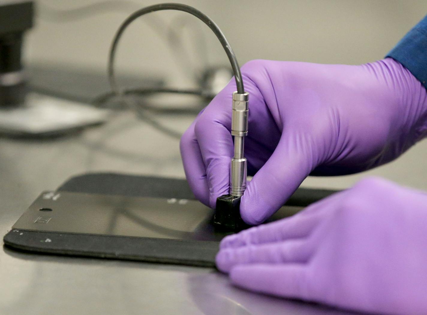 Ryan Sylvester, Sherwin-Williams Company R&D Chemist, measures dry film thickness in the industrial coatings research lab at Sherwin-Williams Tuesday, Nov. 30, 2918, in Minneapolis, MN.] DAVID JOLES &#xef; david.joles@startribune.com Valspar presence in Twin Cities still strong 16 months after sale to Sherwin Williams. Company making rare exception and letting photo in R&D lab in Mpls. Staffing in Mpls increased 25 %since last year's acquisition of Valspar. Sherwin William/Valspar chemists w/b w