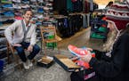 Paul Horan of Gear Running Store helped Laurel Hoch pick out a pair of sneakers. He said his business is on track to beat 2019 numbers.