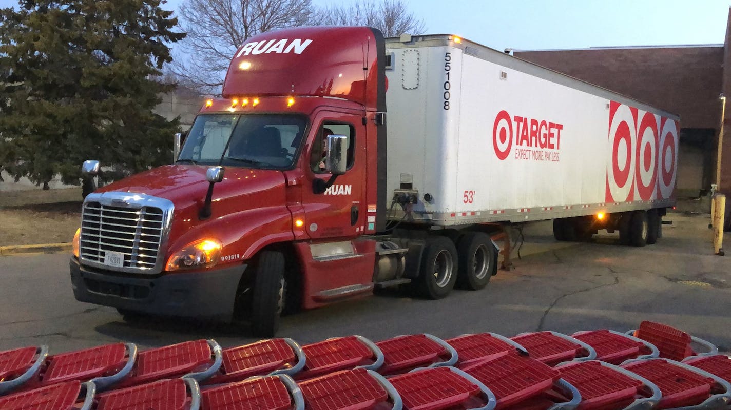 Target and other big grocers are seeing no disruptions in the supply of food and other goods. On Tuesday morning, a truck navigated past shopping carts into a tight warehouse dock at a store in St. Louis Park, Minn.