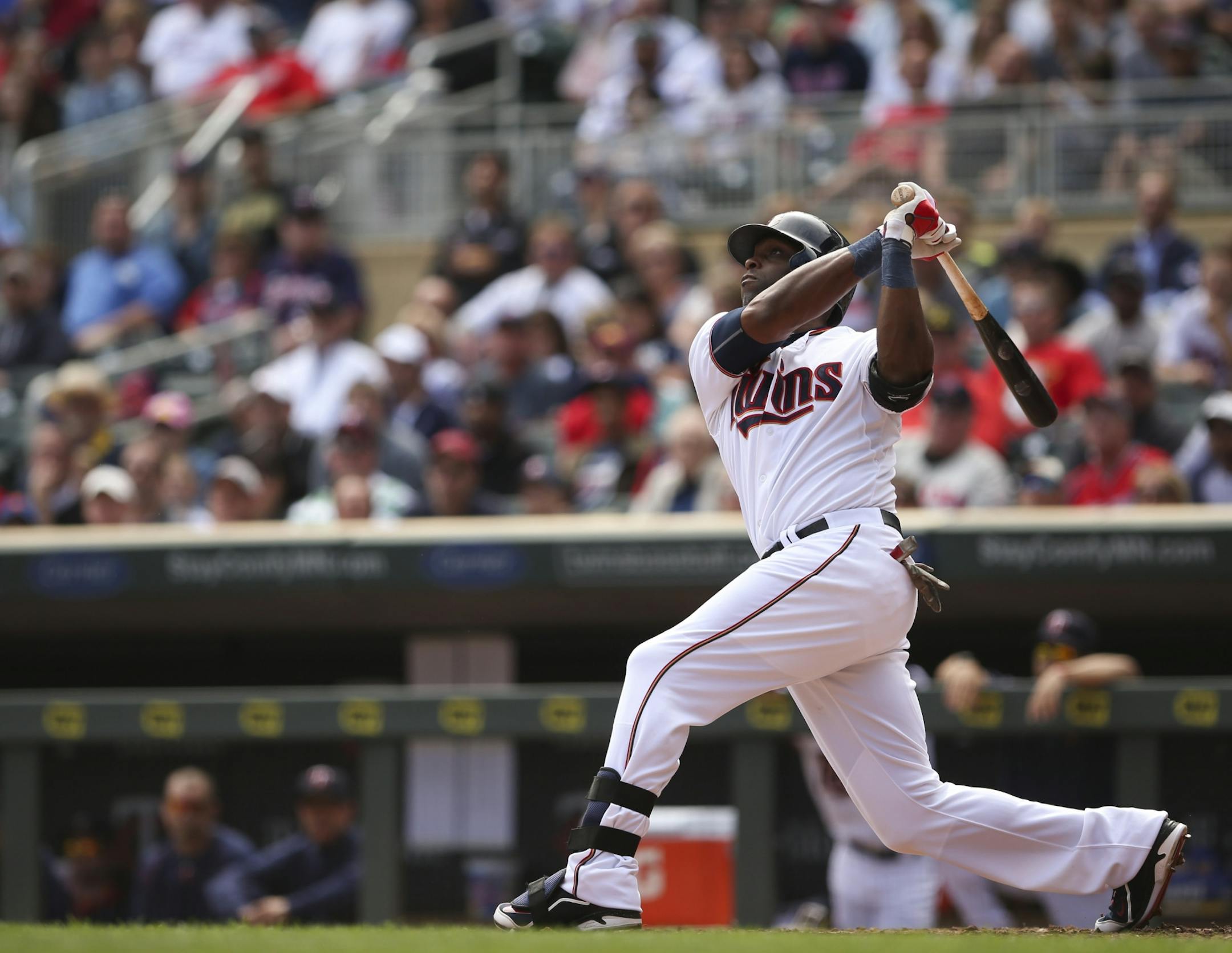 Twins right fielder Torii Hunter (48) watched his second-inning home run sail into the left field stands Sunday afternoon at Target Field. "We can get this wild card," Hunter said. "We just need to do the things we have to do to win."