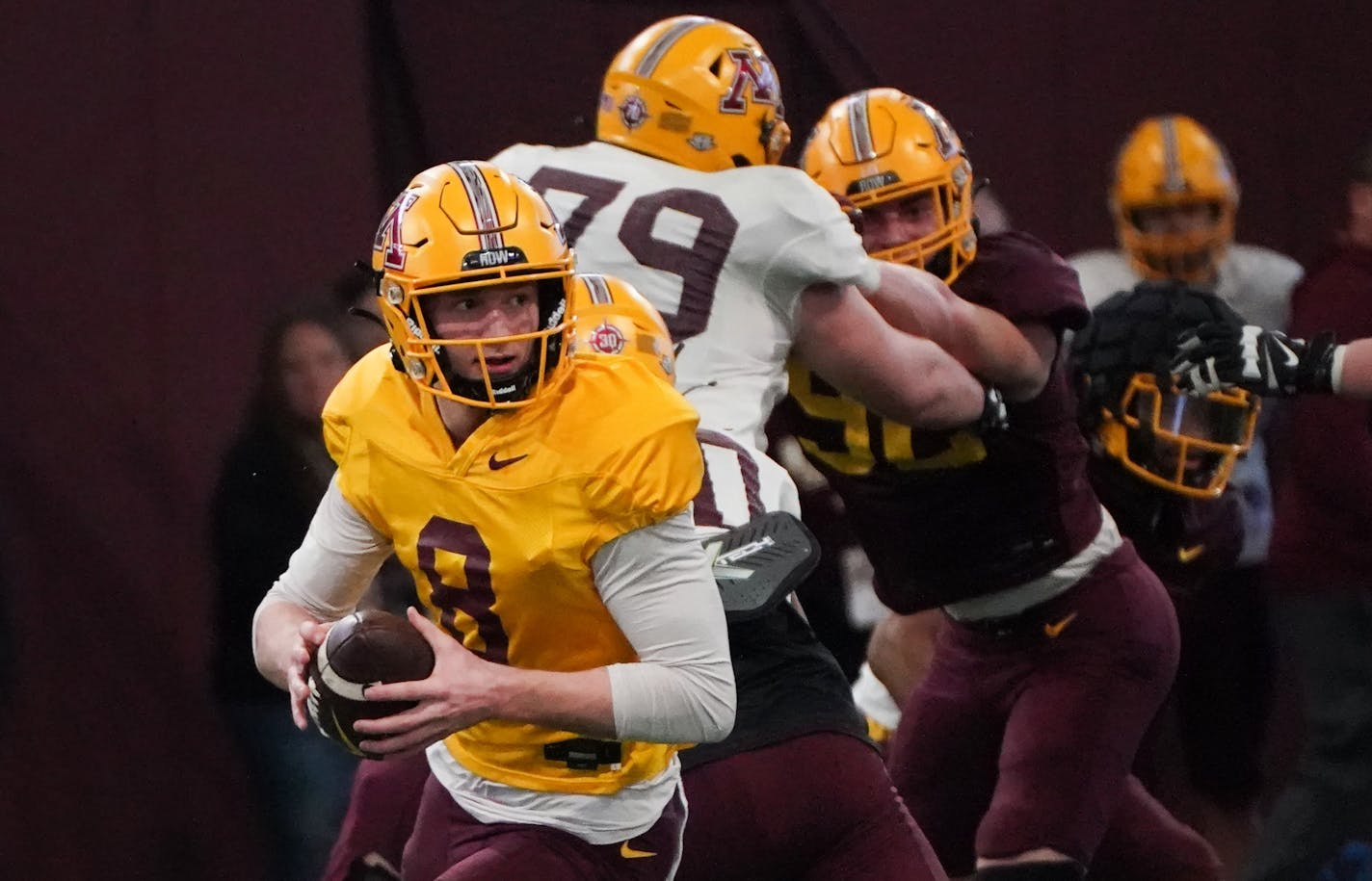 Gophers quarterback Athan Kaliakmanis ran a drill during an open spring practice inside the Athletes Village football training facility on the campus of the University of Minnesota, Saturday, April 16, 2022 in Minneapolis, Minn. ] SHARI L. GROSS / shari.gross@startribune.com